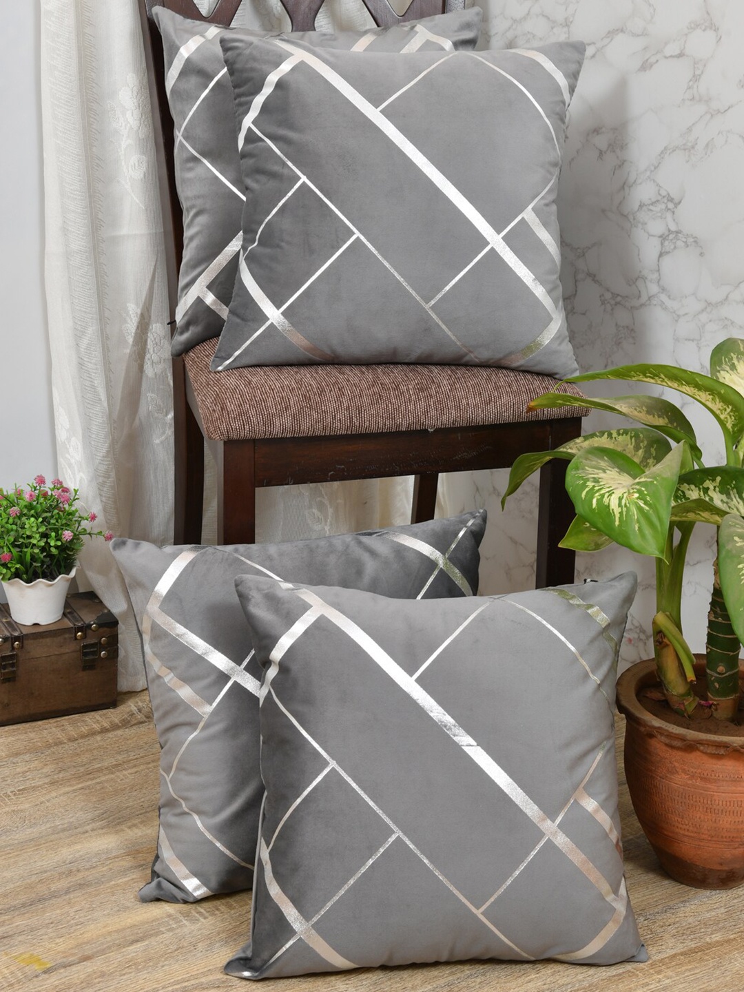 

Clasiko Grey & Silver-Toned Set of 4 Geometric Velvet Square Cushion Covers