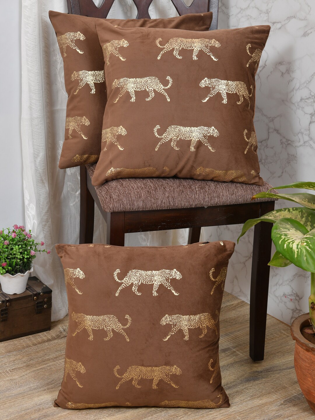 

Clasiko Brown Set Of 3 Quirky Printed Velvet Square Cushion Covers