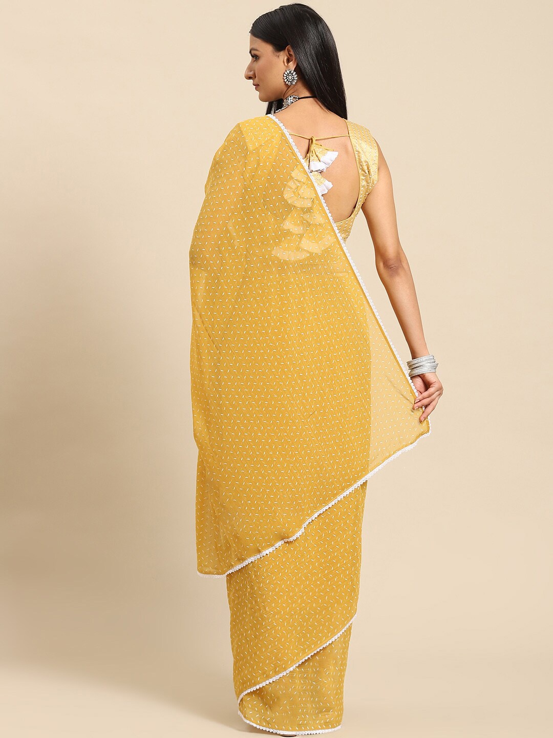 

Mitera Ethnic Motifs Embroidered Saree, Yellow