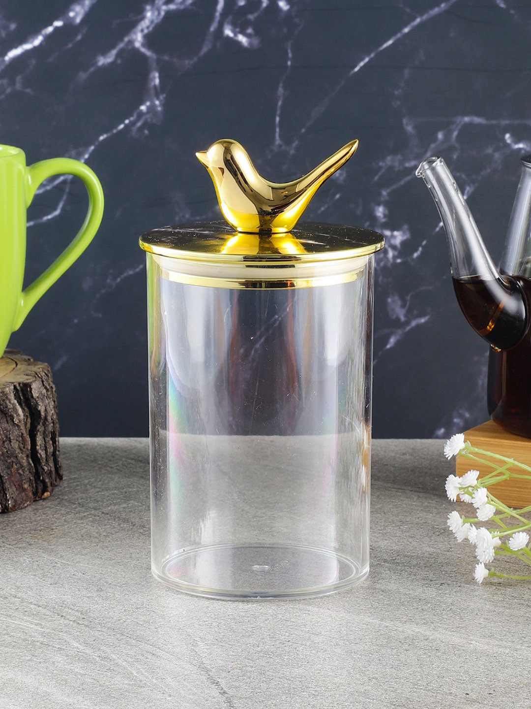 

The Decor Mart Transparent Glass Storage Jar With Bird Detail On Lid