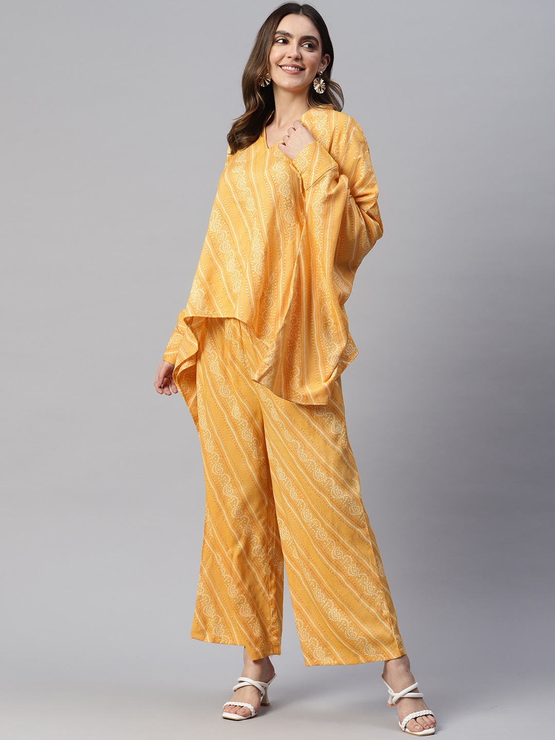 

Cottinfab Women Printed Top With Palazzos, Yellow