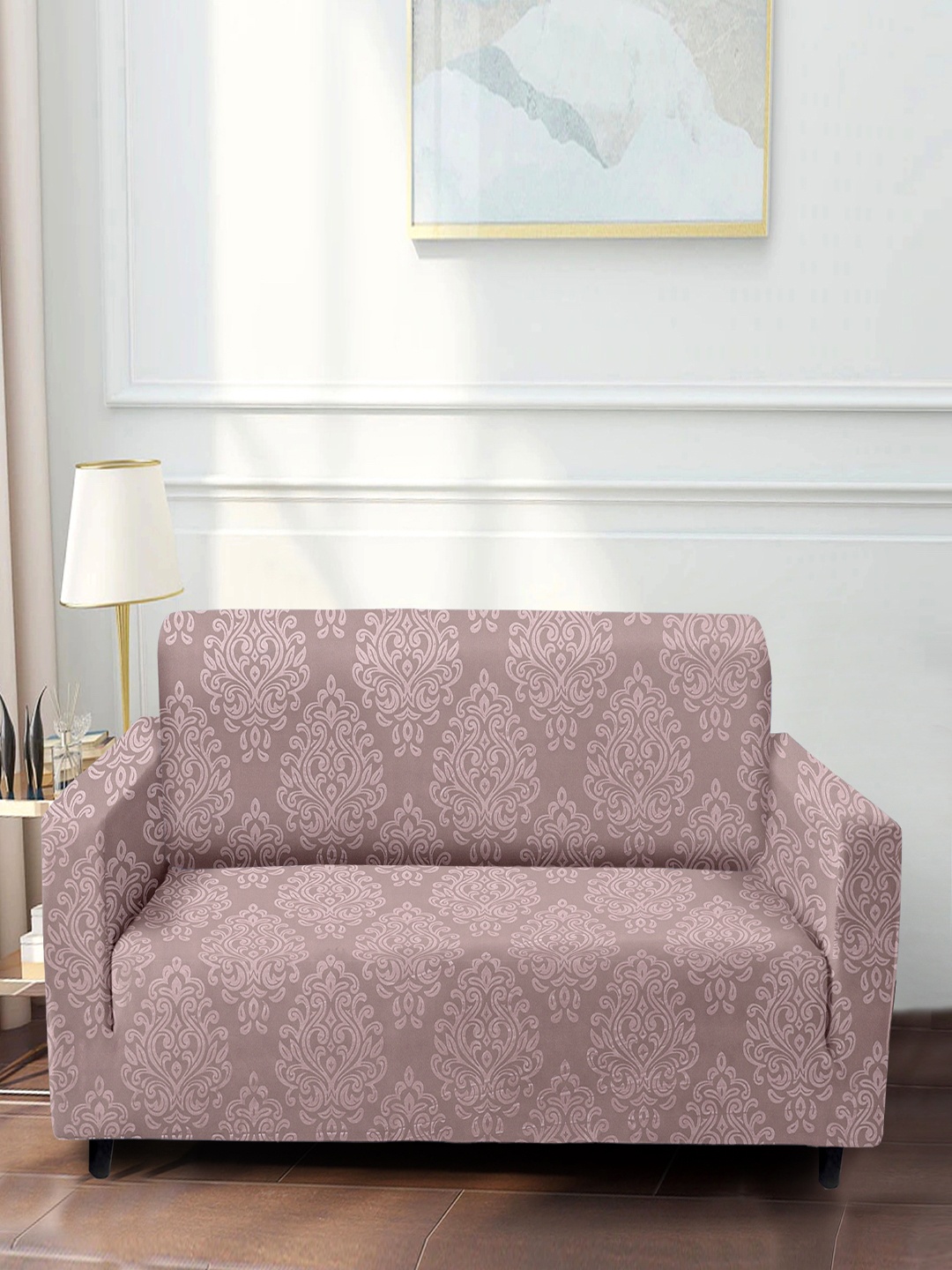 

Cortina Peach Ethnic Motif Printed Stretchable 3-Seater Sofa Cover