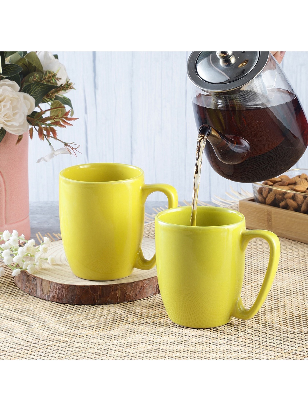 

The Decor Mart Set of 2 Yellow Solid Ceramic Glossy Mugs 330 ml Each