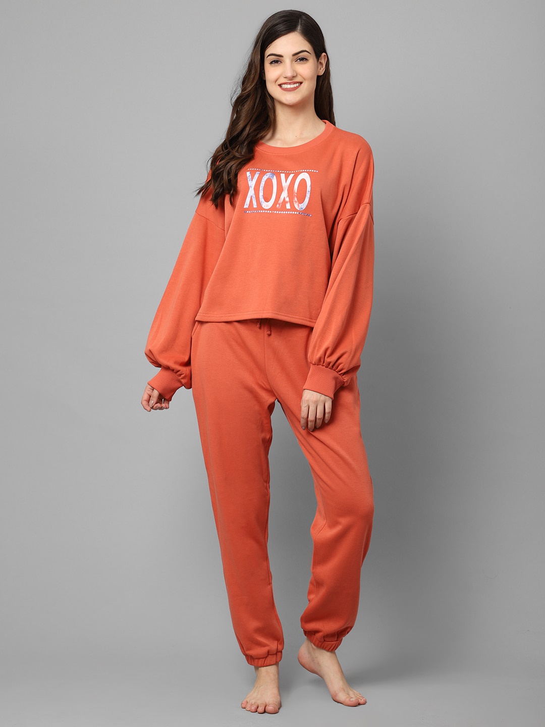 

Aerowarm Women Printed Fleece Night suit, Rust