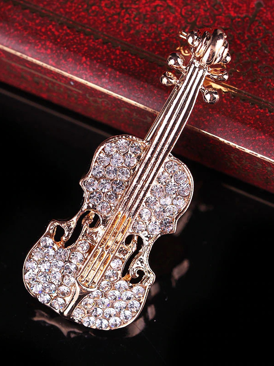 

YouBella Women Stone-Studded Guitar-Shaped Brooch, White