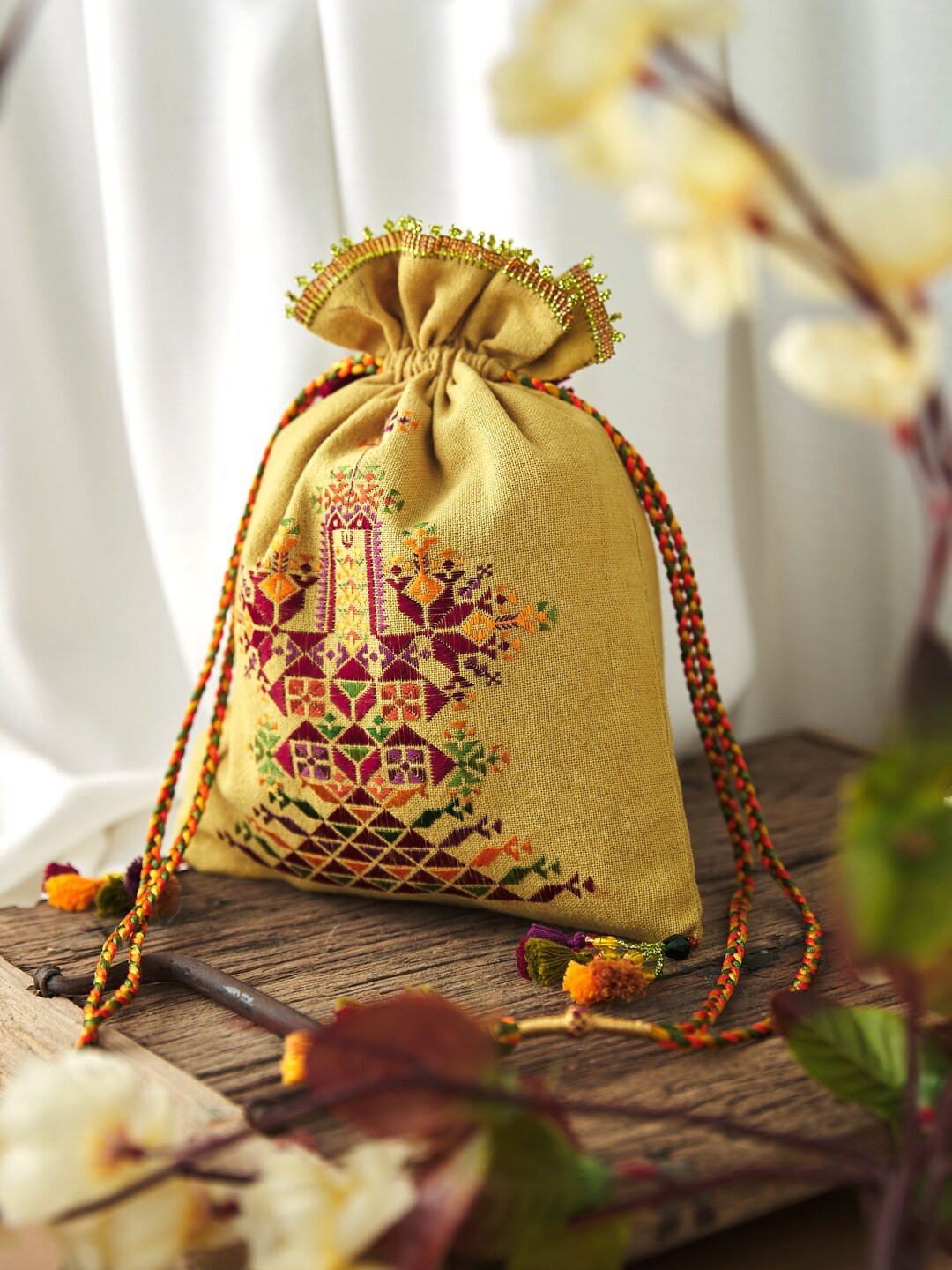 

Fabindia FabBasic Embroidered Potli Clutch, Yellow