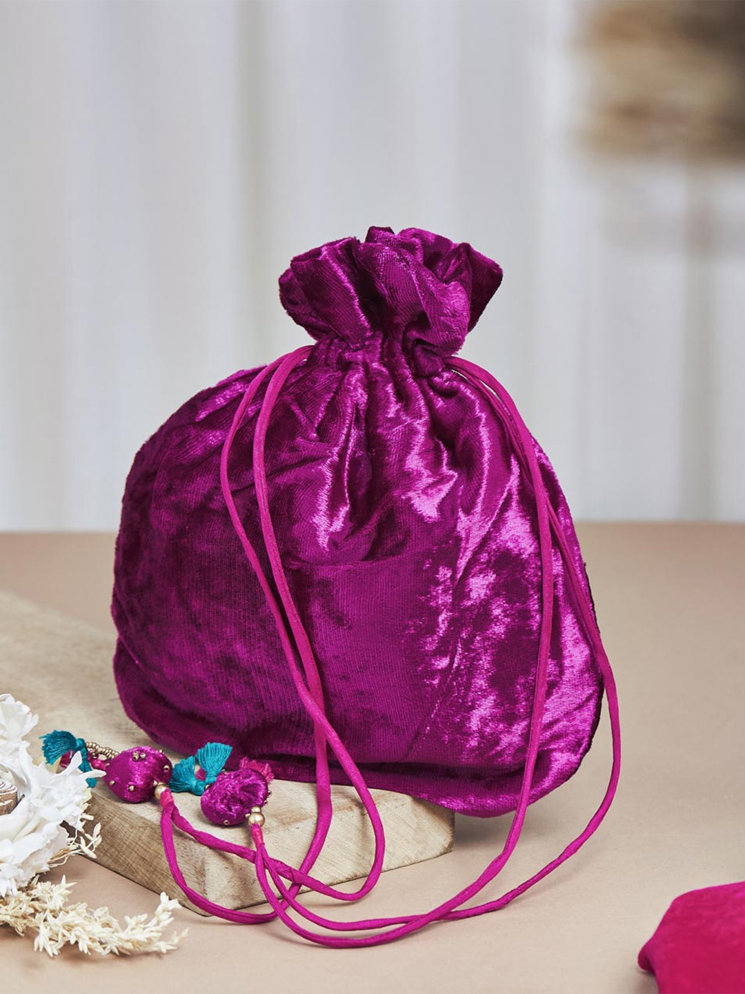 

Fabindia Tasselled Potli Clutch, Purple