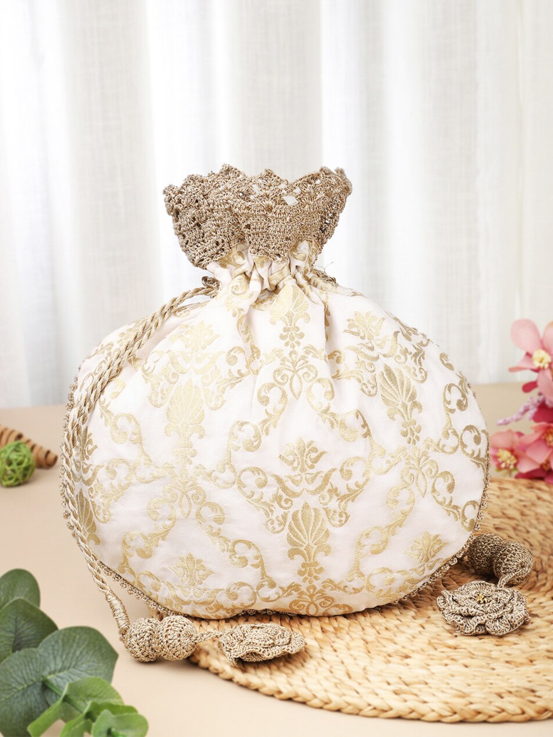 

Fabindia Woven Design Tasselled Potli Clutch, White