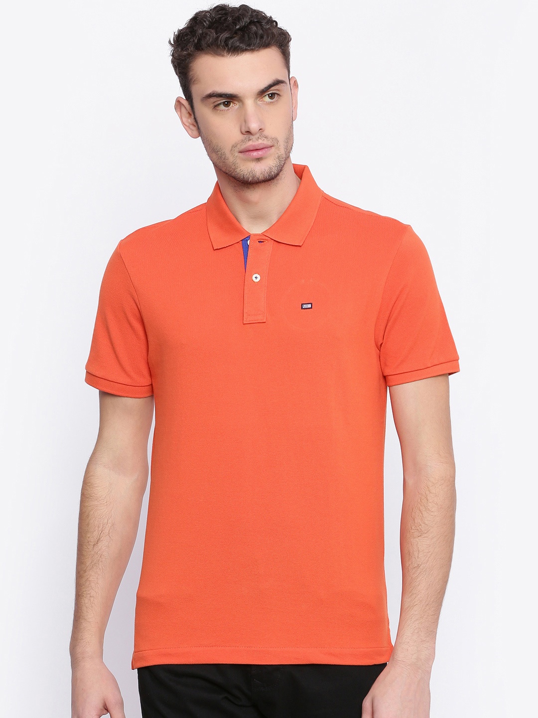 

Arrow Sport Men Orange Solid Polo Collar T-shirt