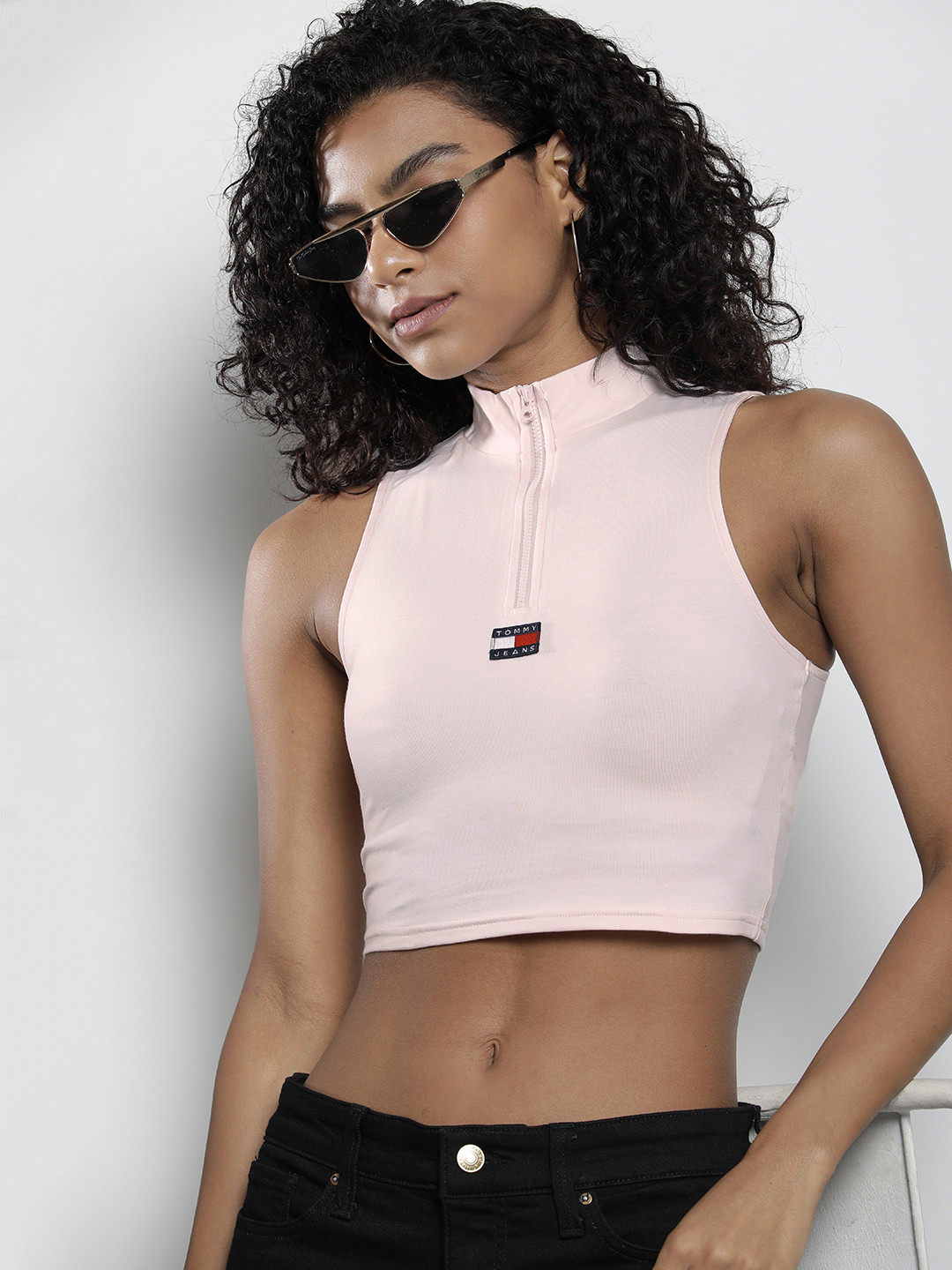 

Tommy Hilfiger Solid High Neck Sleeveless Fitted Crop Top With Applique Detail, Pink