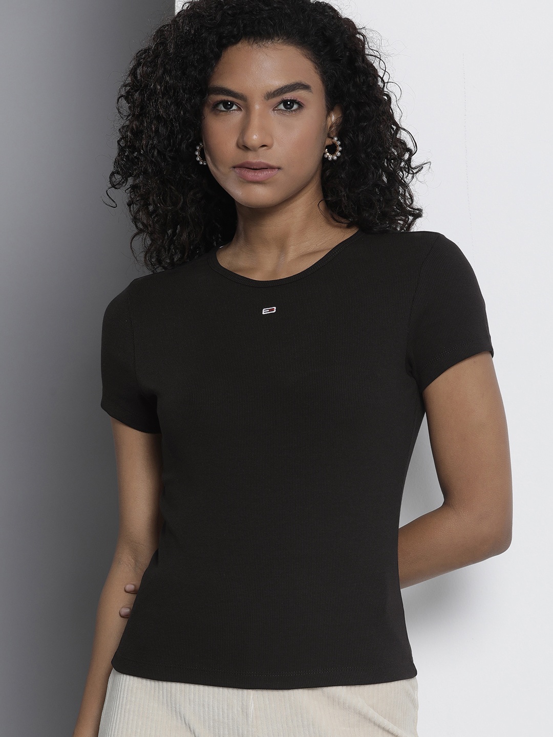 

Tommy Hilfiger Women Solid Ribbed Slim Fit T-shirt, Black