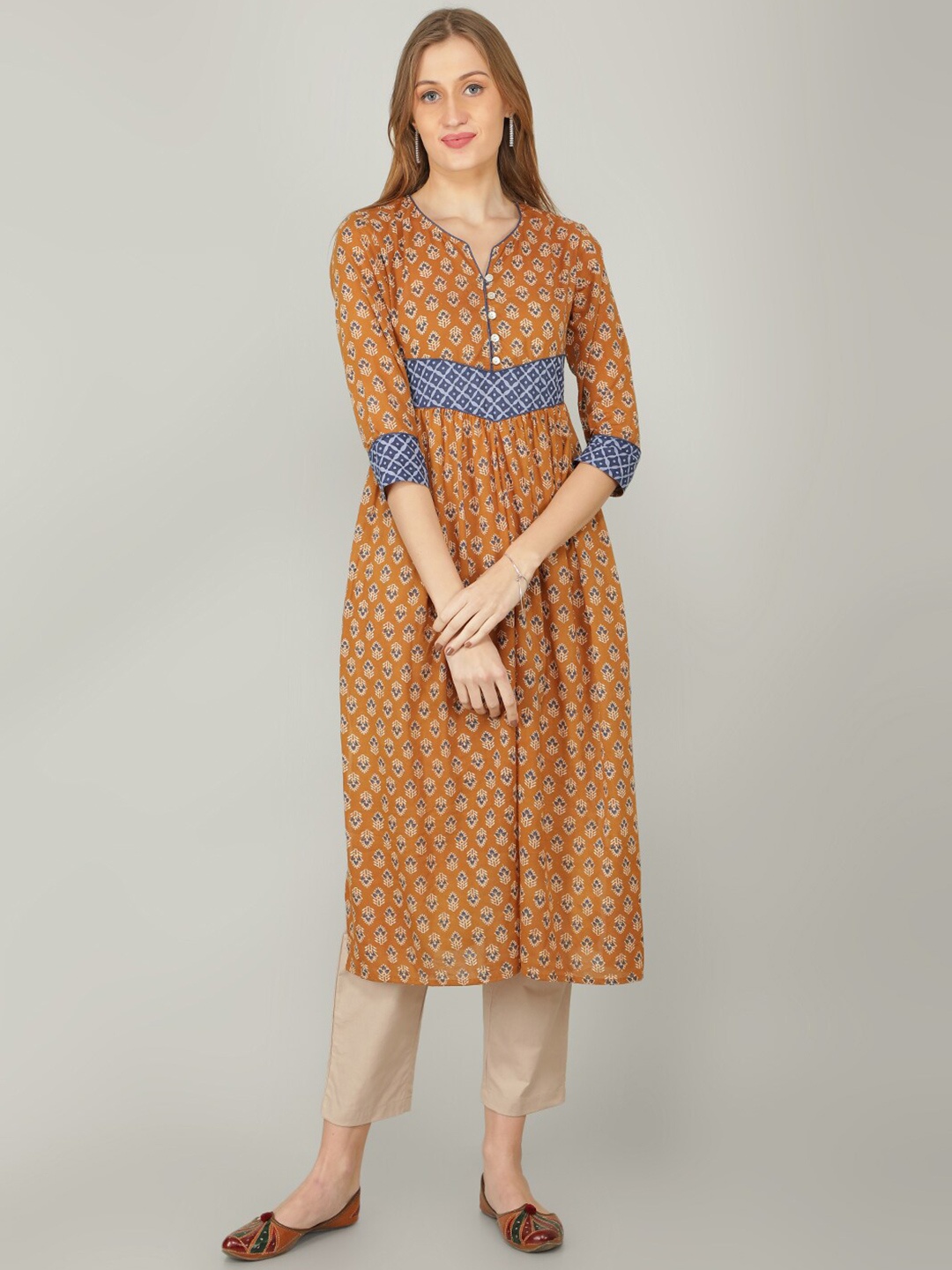 

NAVIYATA Women Ethnic Motifs Printed Empire Pure Cotton Kurta with Trousers, Mustard