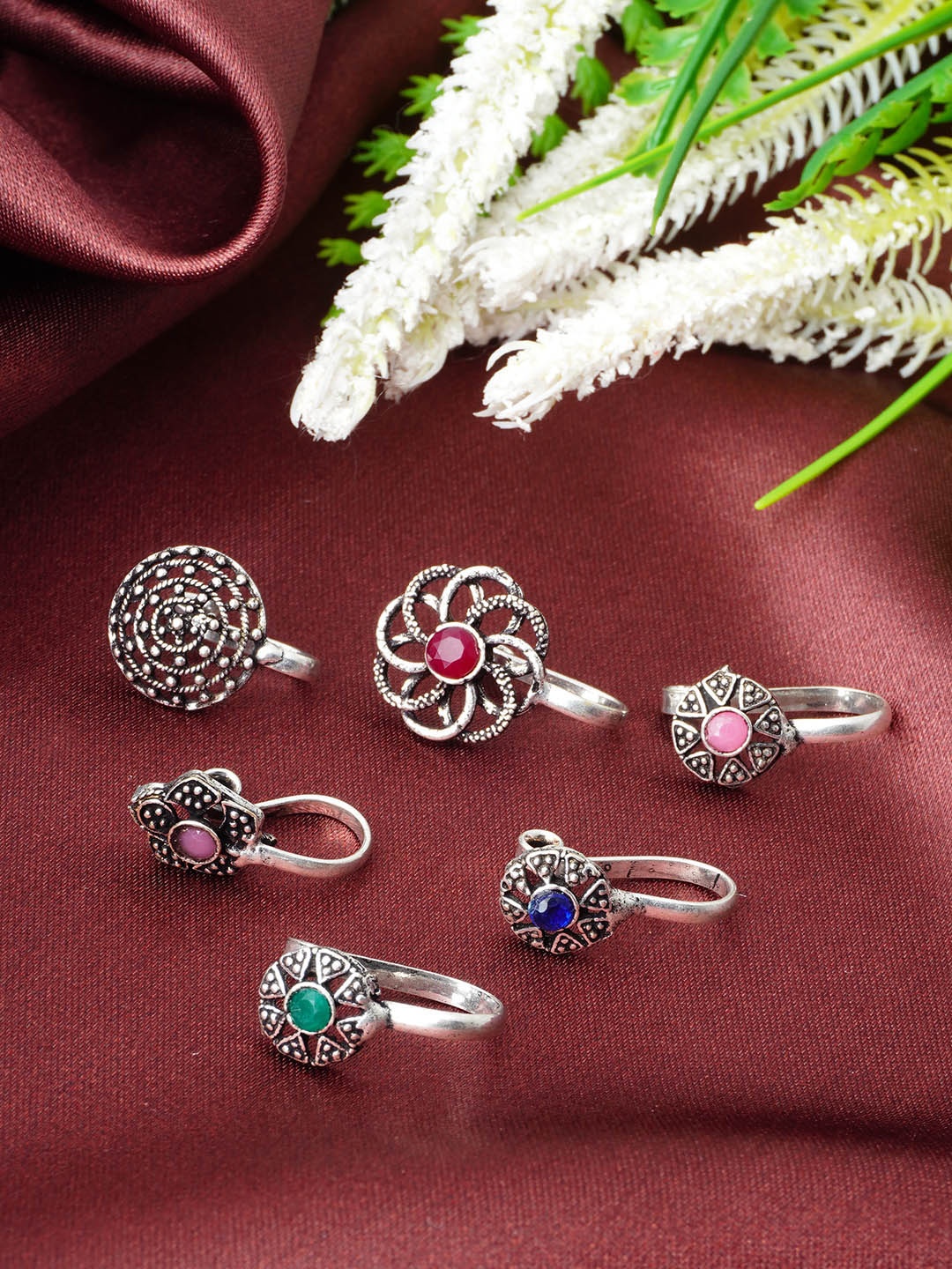 

Urmika Set Of 6 Silver-Plated Stones-Studded Clip-On Nosepin