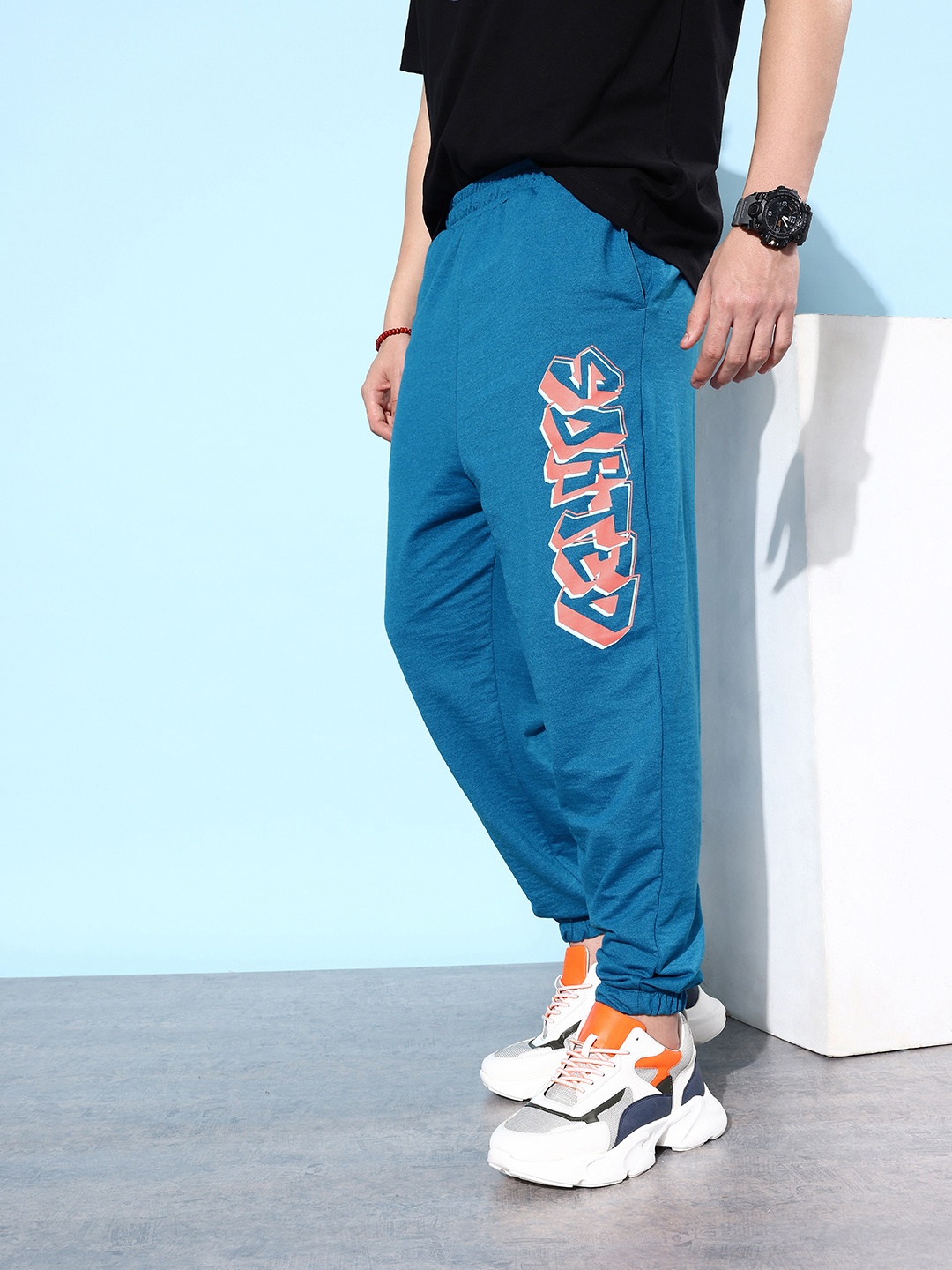 

Kook N Keech Men Typography Printed Track Pant, Blue