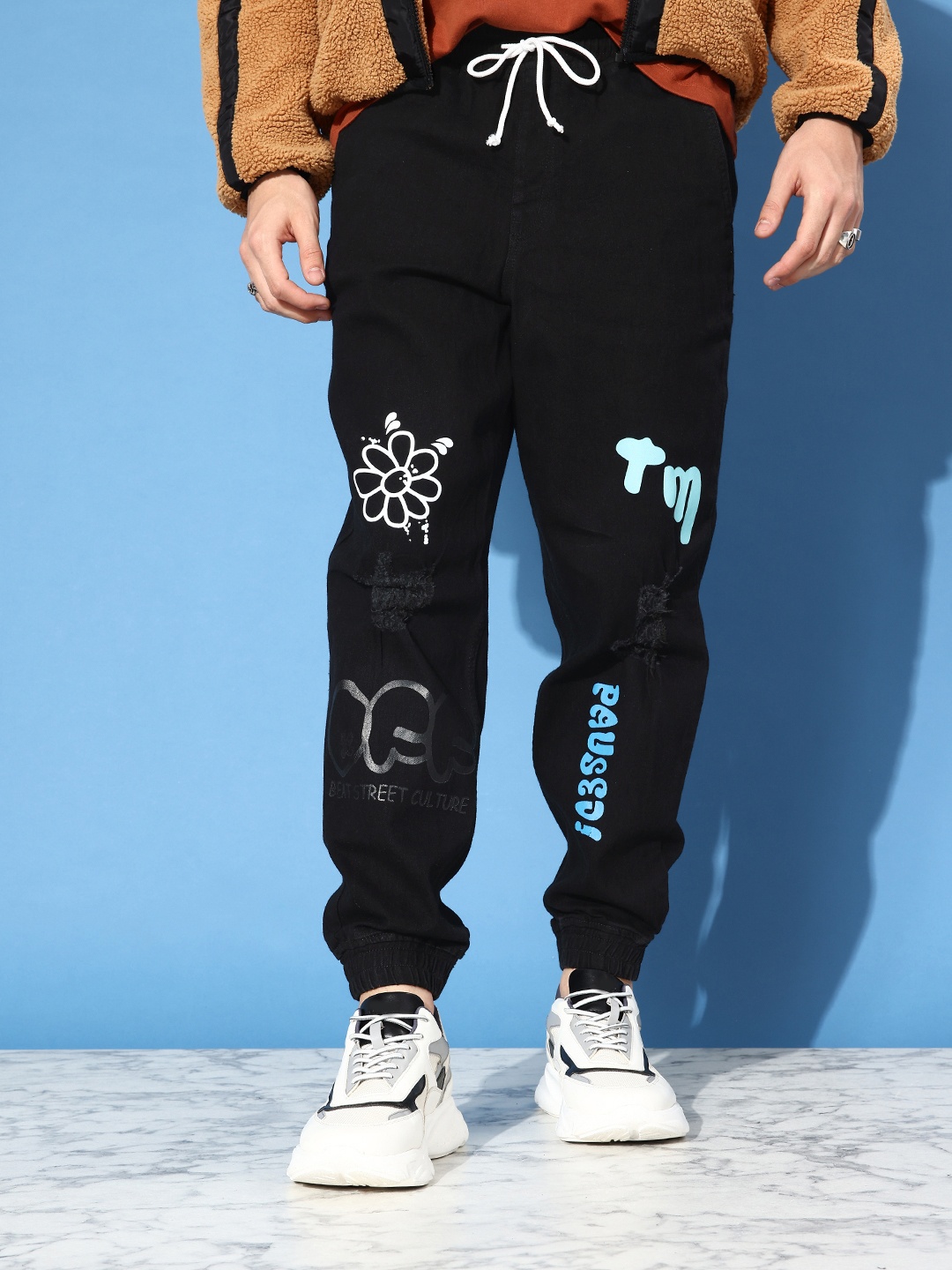 

Kook N Keech Men Jet Black Forever Vacay Graffiti Printed Stretchable Loose Joggers Jeans