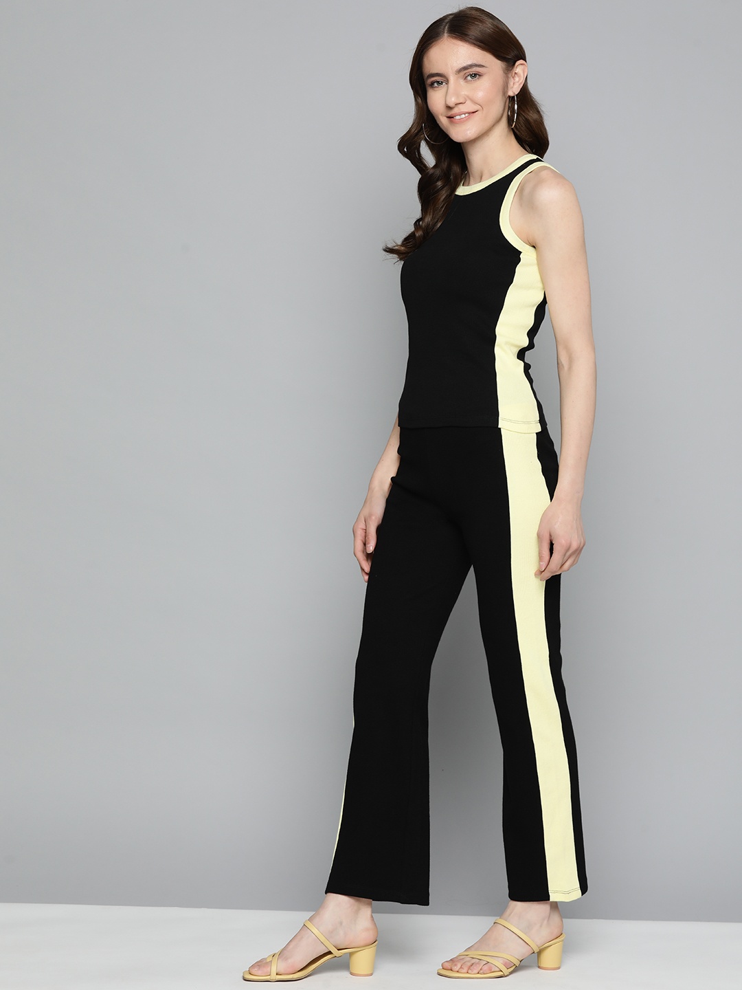 

VividArtsy Women Yellow & Black Colourblocked Top with Trousers