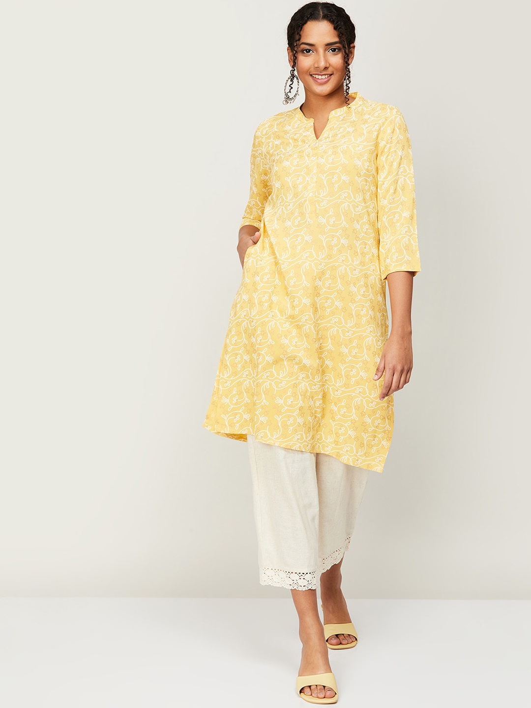 

Melange by Lifestyle Women Bandhani Printed Kurta, Mustard