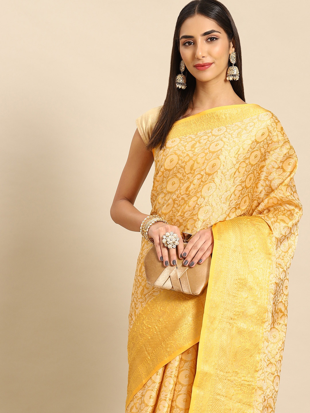 

Anouk Floral Zari Silk Blend Kanjeevaram Saree, Yellow