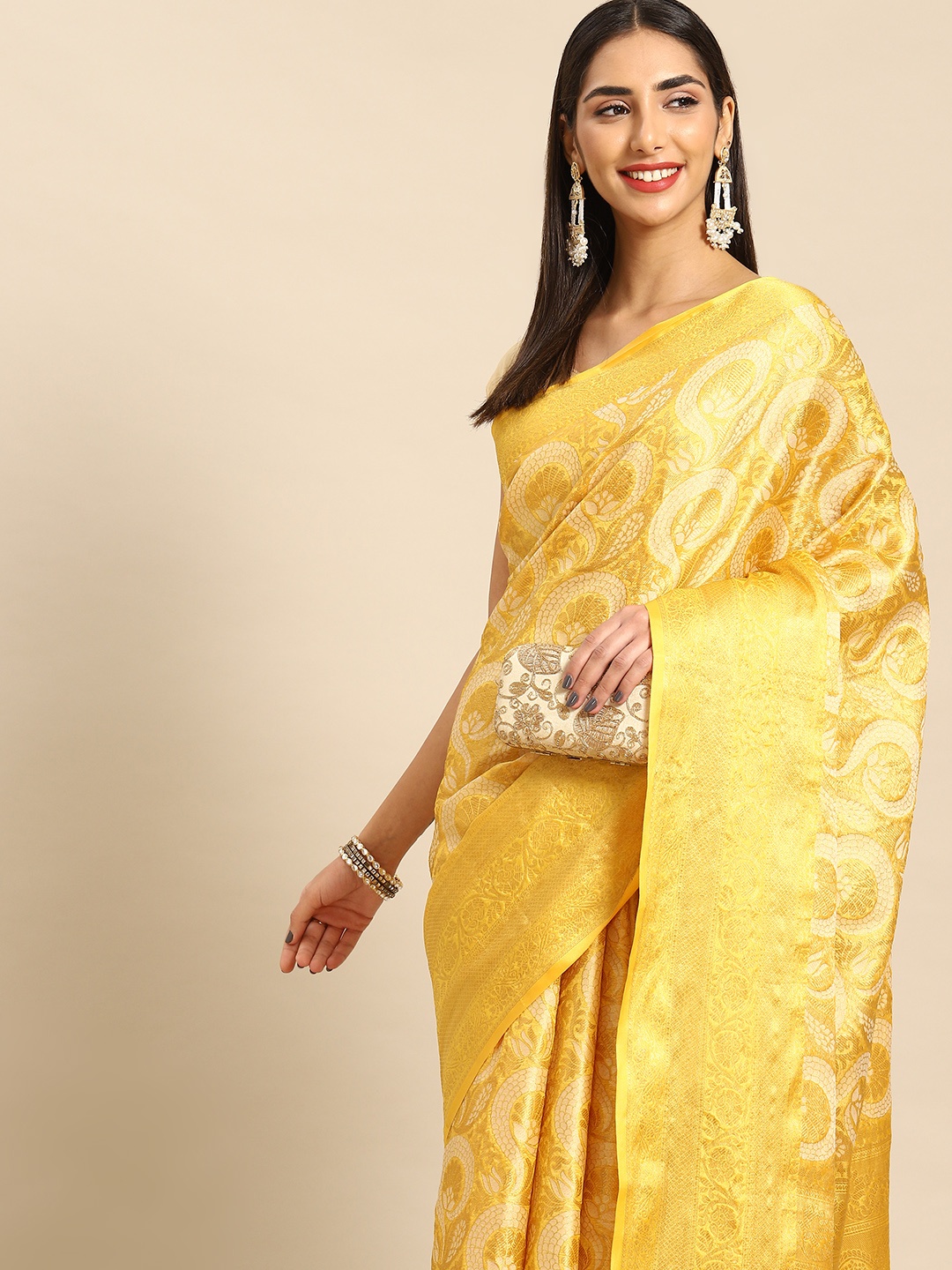 

Anouk Ethnic Motifs Zari Silk Blend Kanjeevaram Saree, Yellow