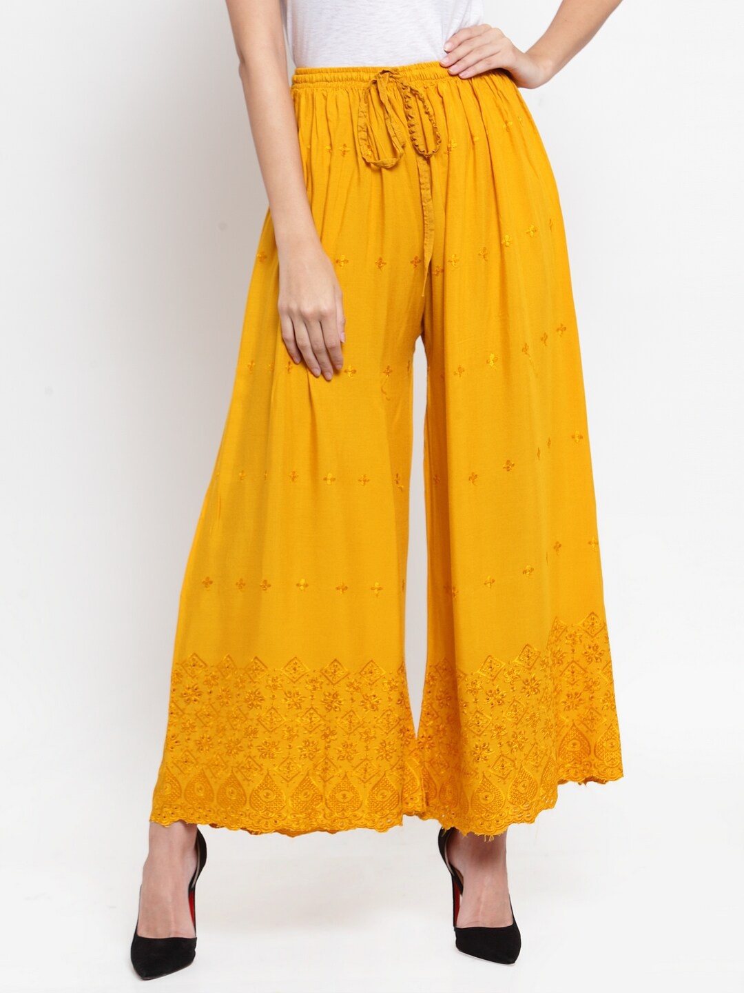 

Clora Creation Women Ethnic Motifs Embroidered Flared Palazzos, Mustard