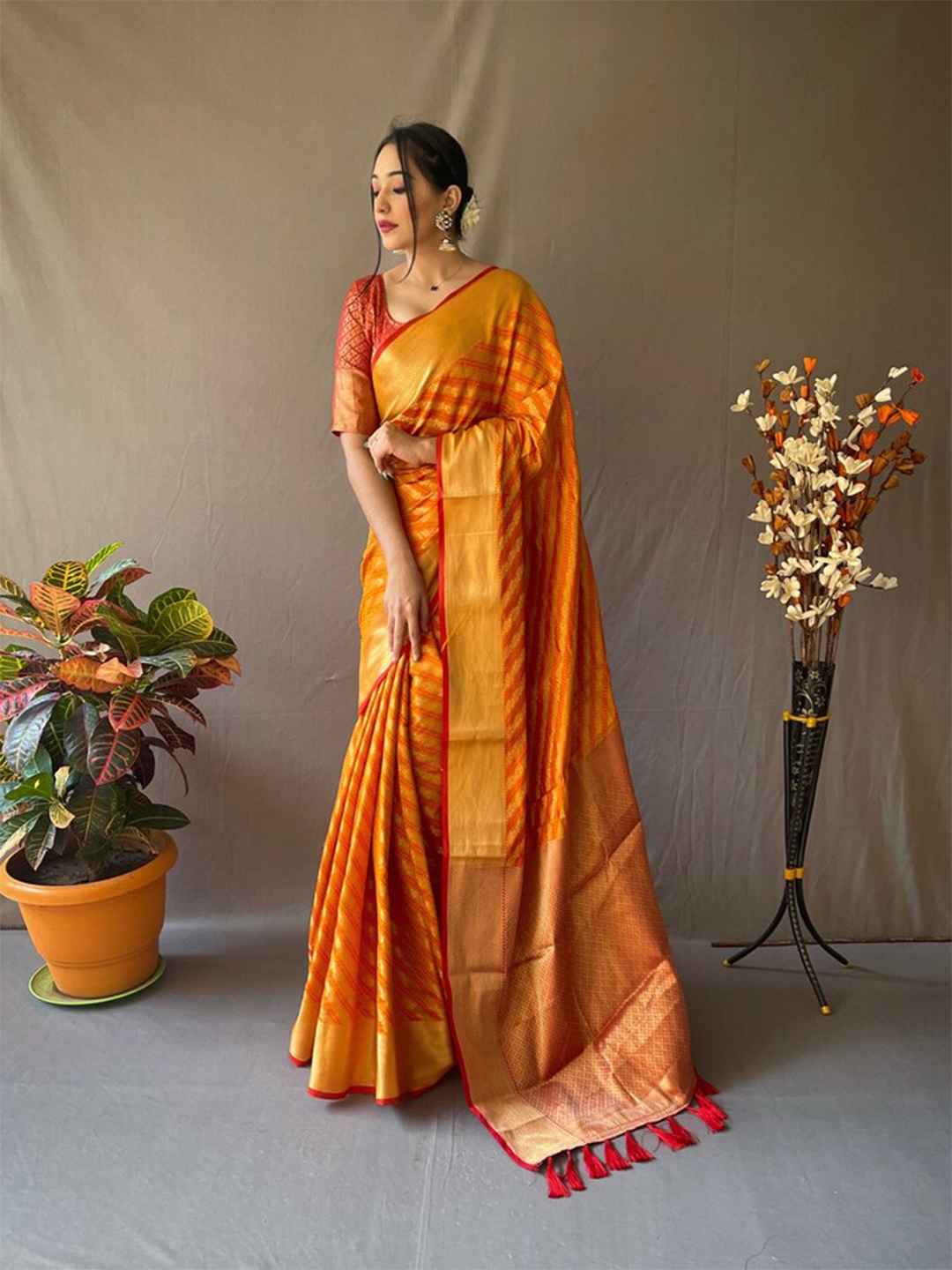 

Exclusiva Ethnic Motifs Zari Silk Blend Patola Saree, Mustard