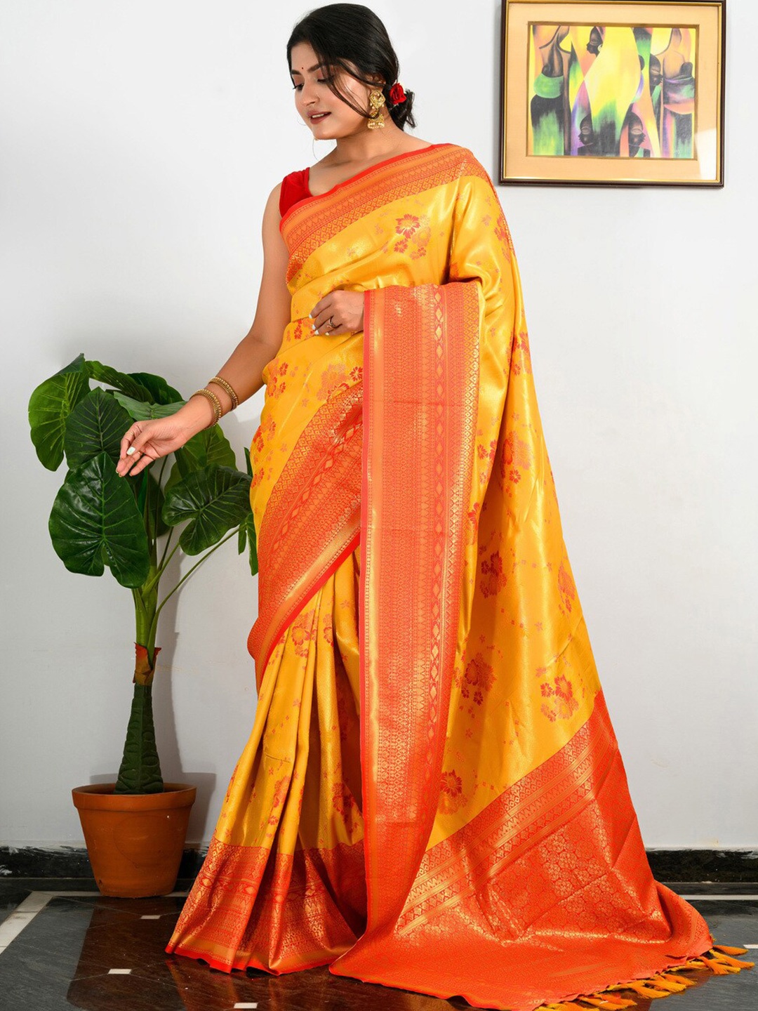 

Exclusiva Woven Design Zari Silk Blend Kanjeevaram Saree, Yellow