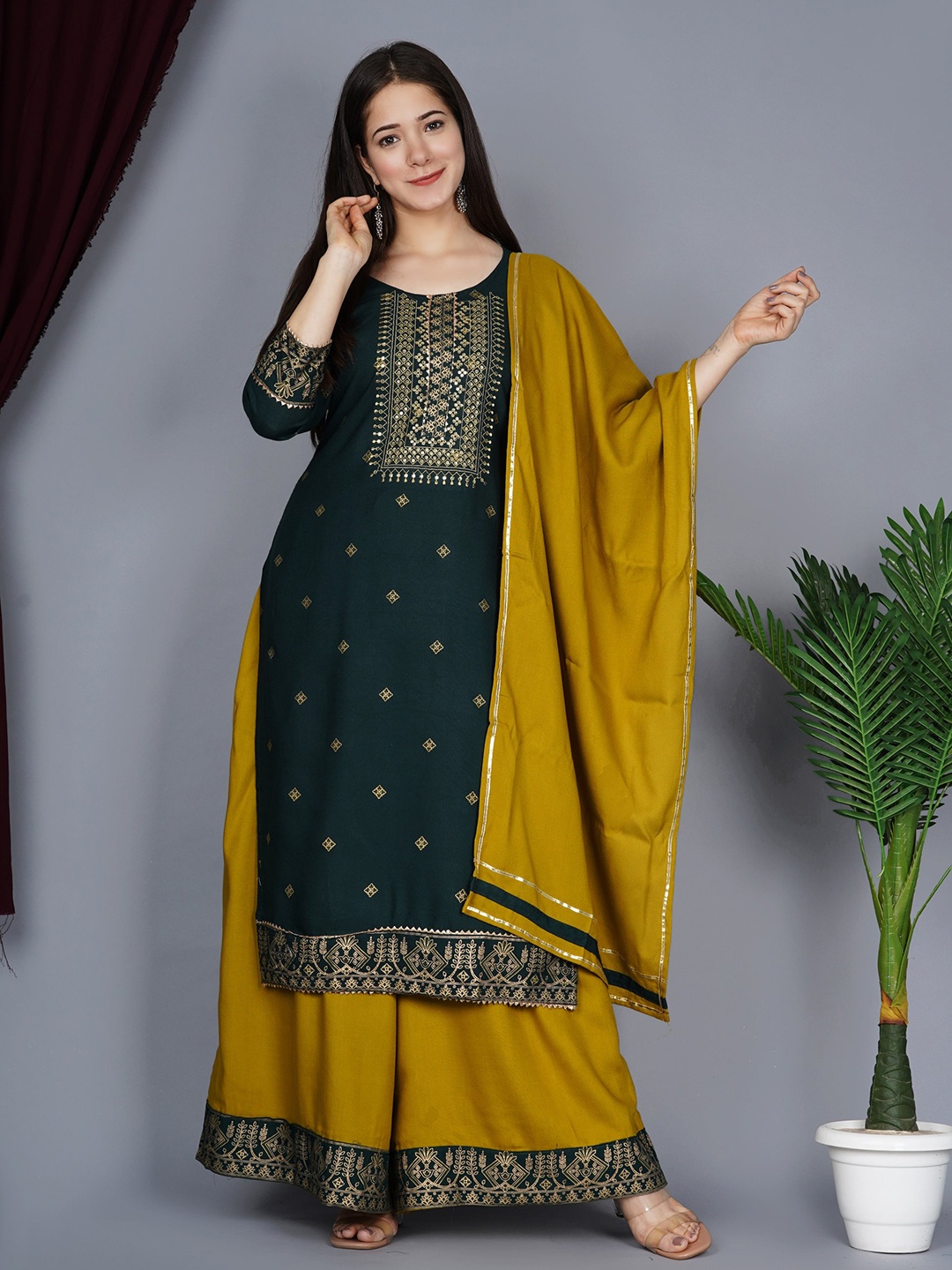 

KALINI Women Ethnic Motifs Embroidered Kurta with Palazzos & Dupatta, Green