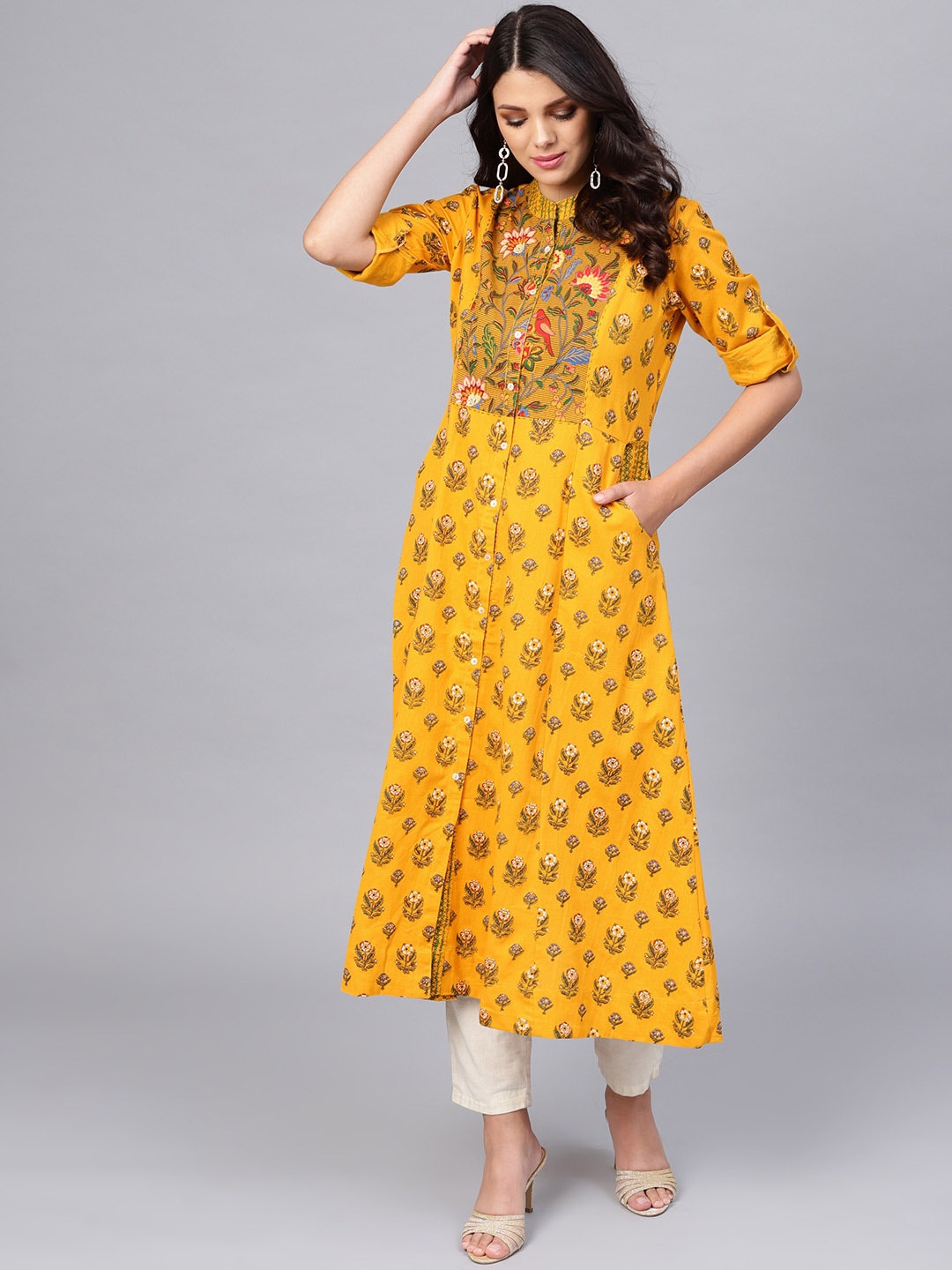 

Divena Women Printed Floral Mandarin Collar Cotton Kurta, Yellow