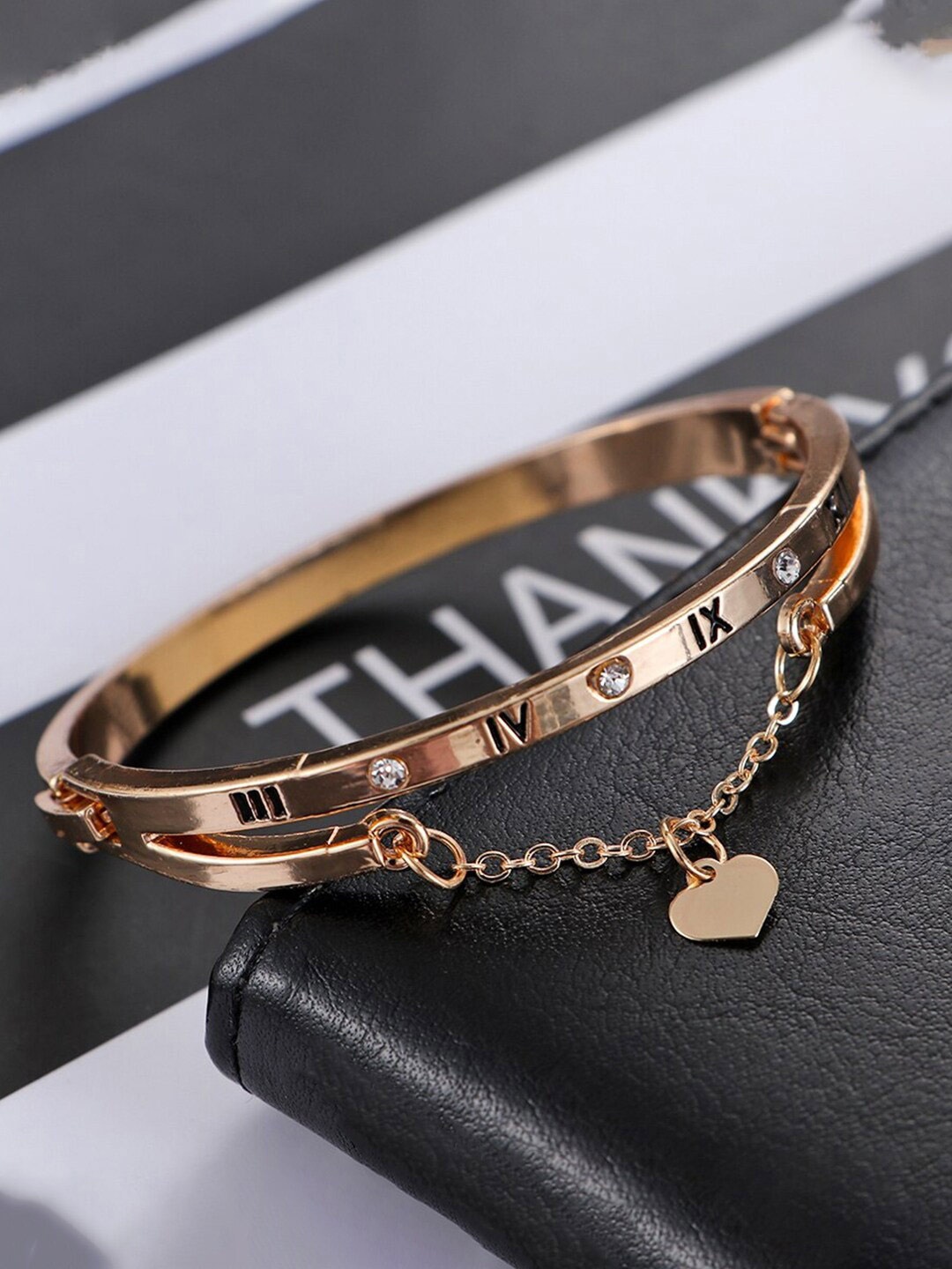 

Jewels Galaxy Women Gold-Plated Brass Bangle-Style Bracelet