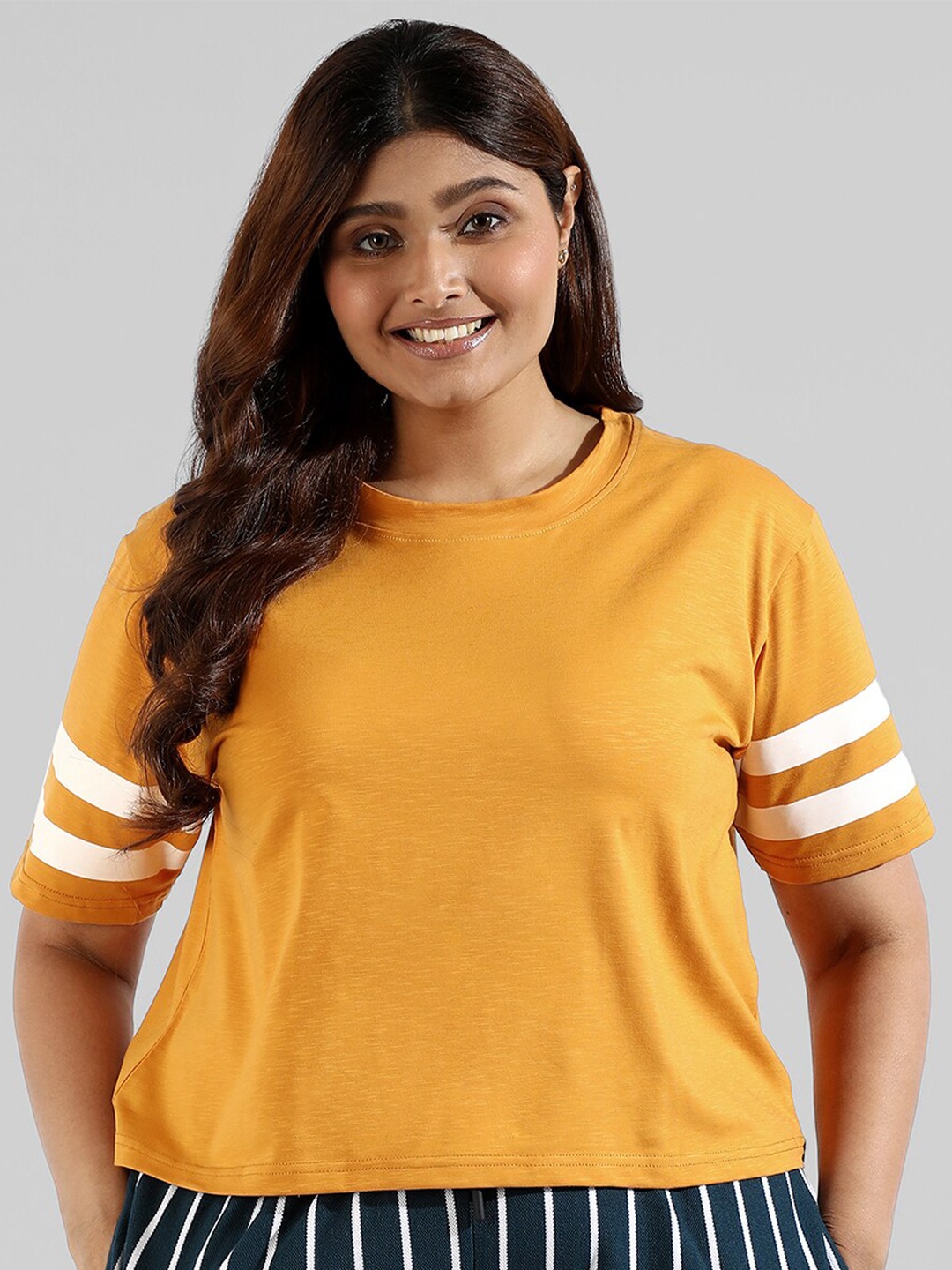 

Instafab Plus Women Plus Size Round Neck Cotton Top, Mustard