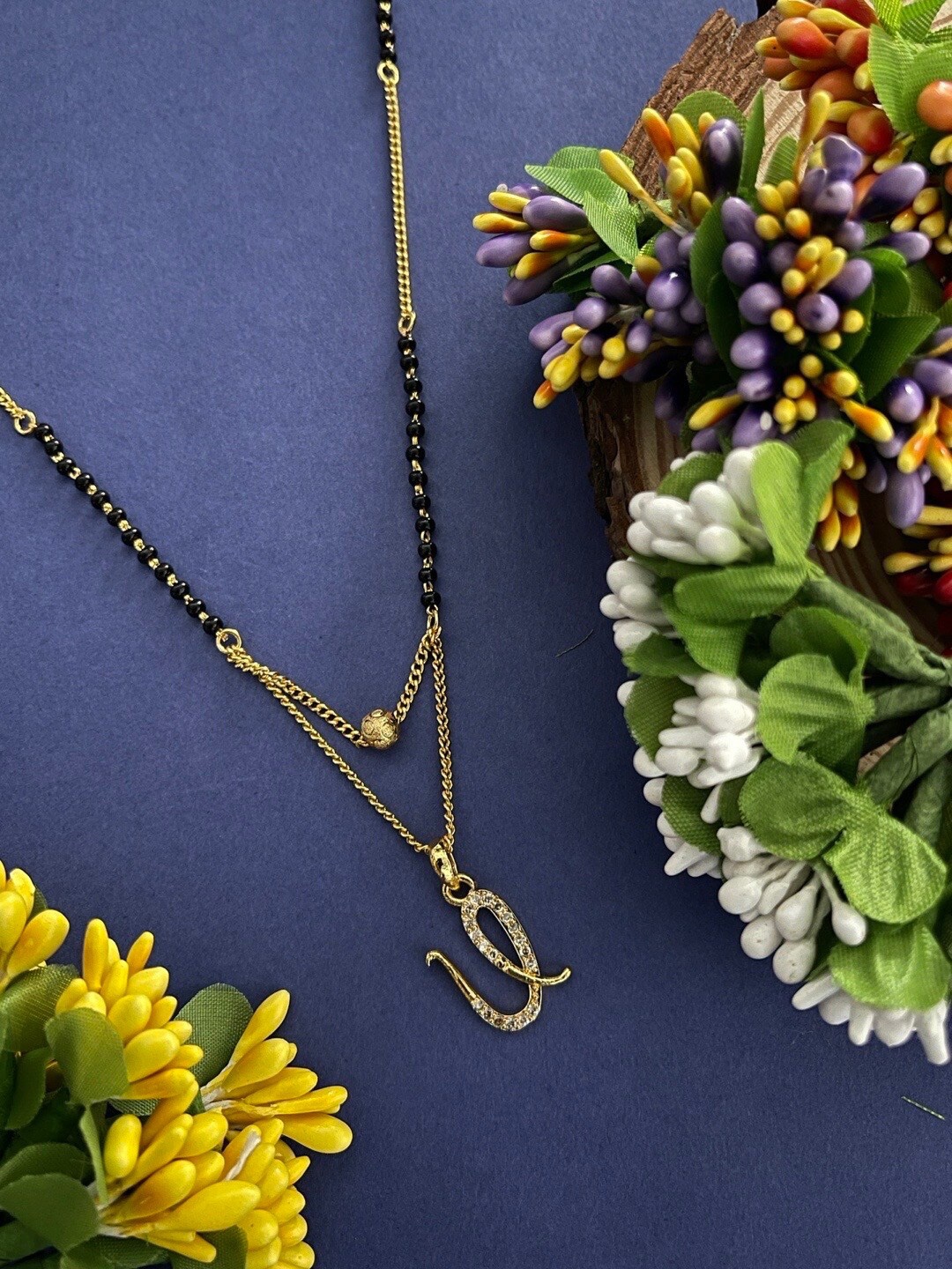 

Digital Dress Room Gold-Plated Stone-Studded & Beaded Mangalsutra