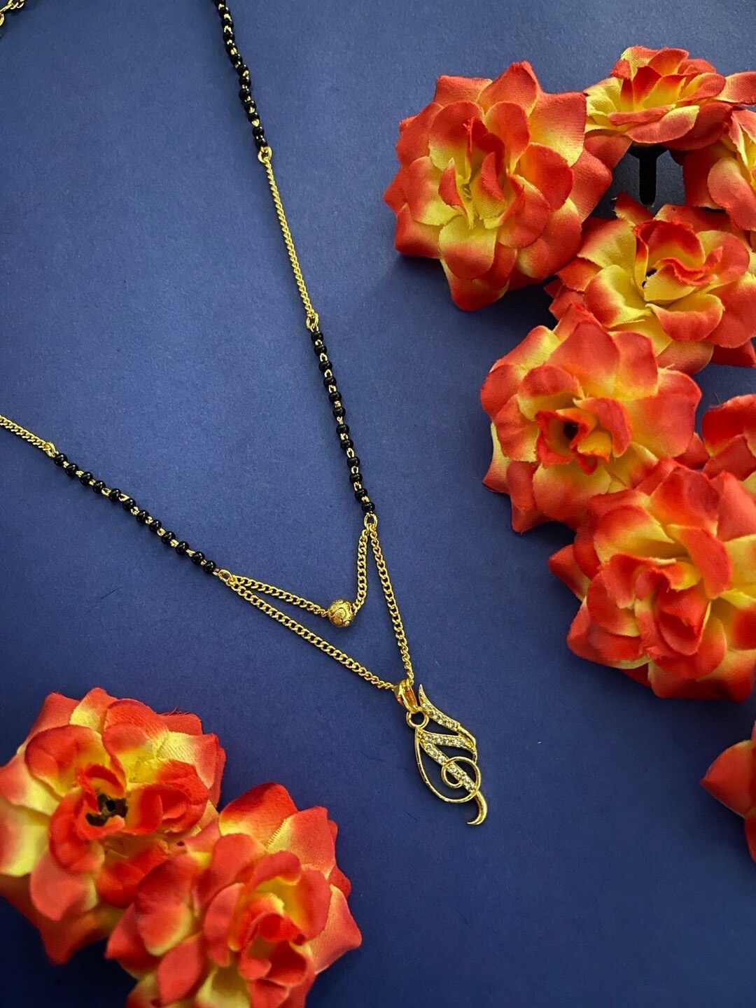 

Digital Dress Room Gold-Plated AD Stone-Studded & Beaded Mangalsutra