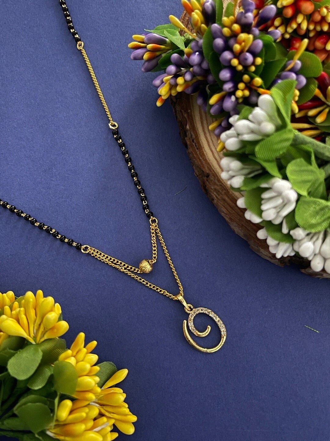 

Digital Dress Room Gold-Plated Stone-Studded & Beaded Mangalsutra