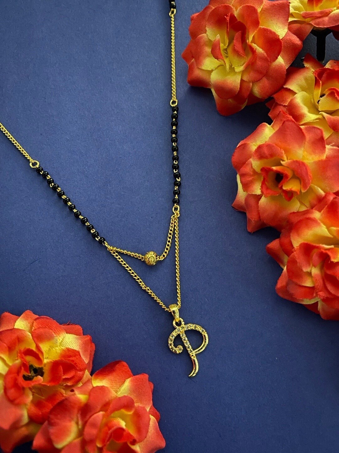 

Digital Dress Room Gold-Plated Stone-Studded & Black-Beaded Mangalsutra
