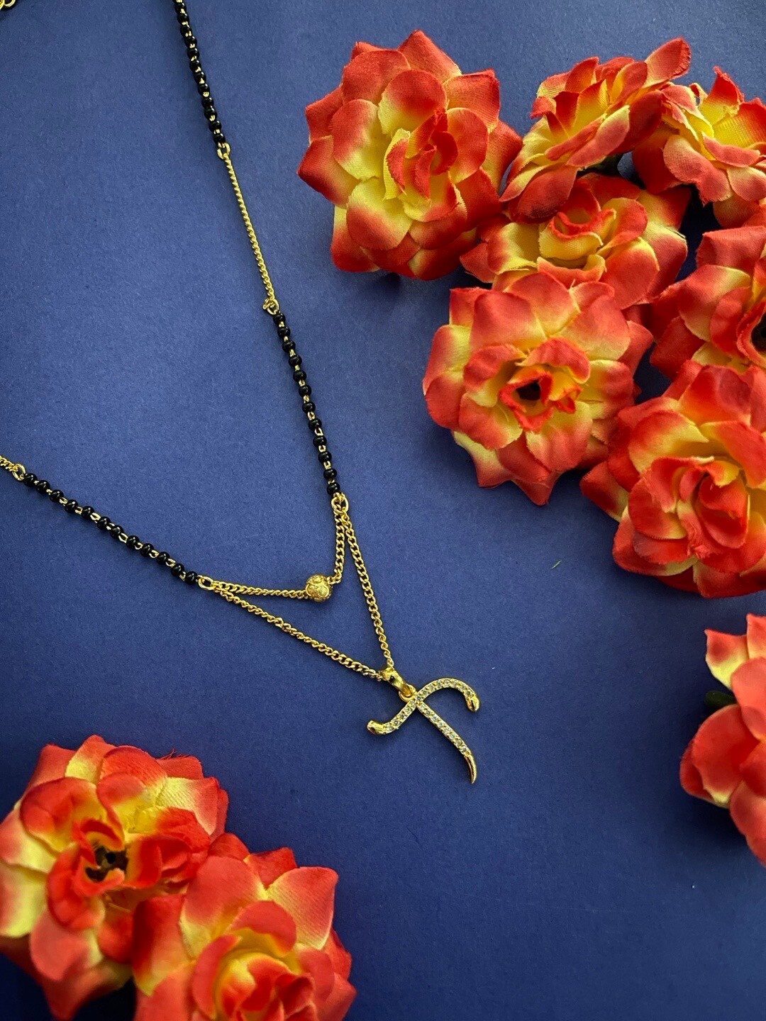 

Digital Dress Room Gold-Plated T Stone-Studded & Beaded Mangalsutra, Black