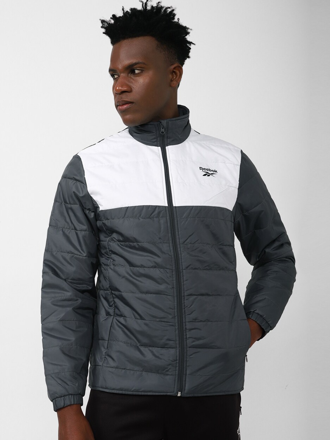 

Reebok Men Colourblocked Rbk Fitness Light Padded MP Jacket, Grey