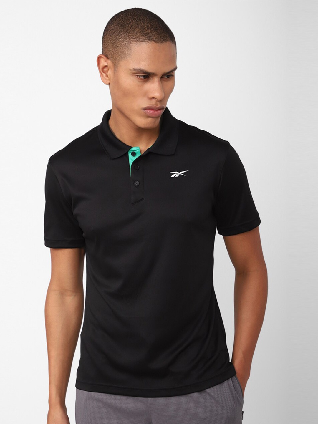 

Reebok Men Training Foundation Poly Polo T-shirt, Black