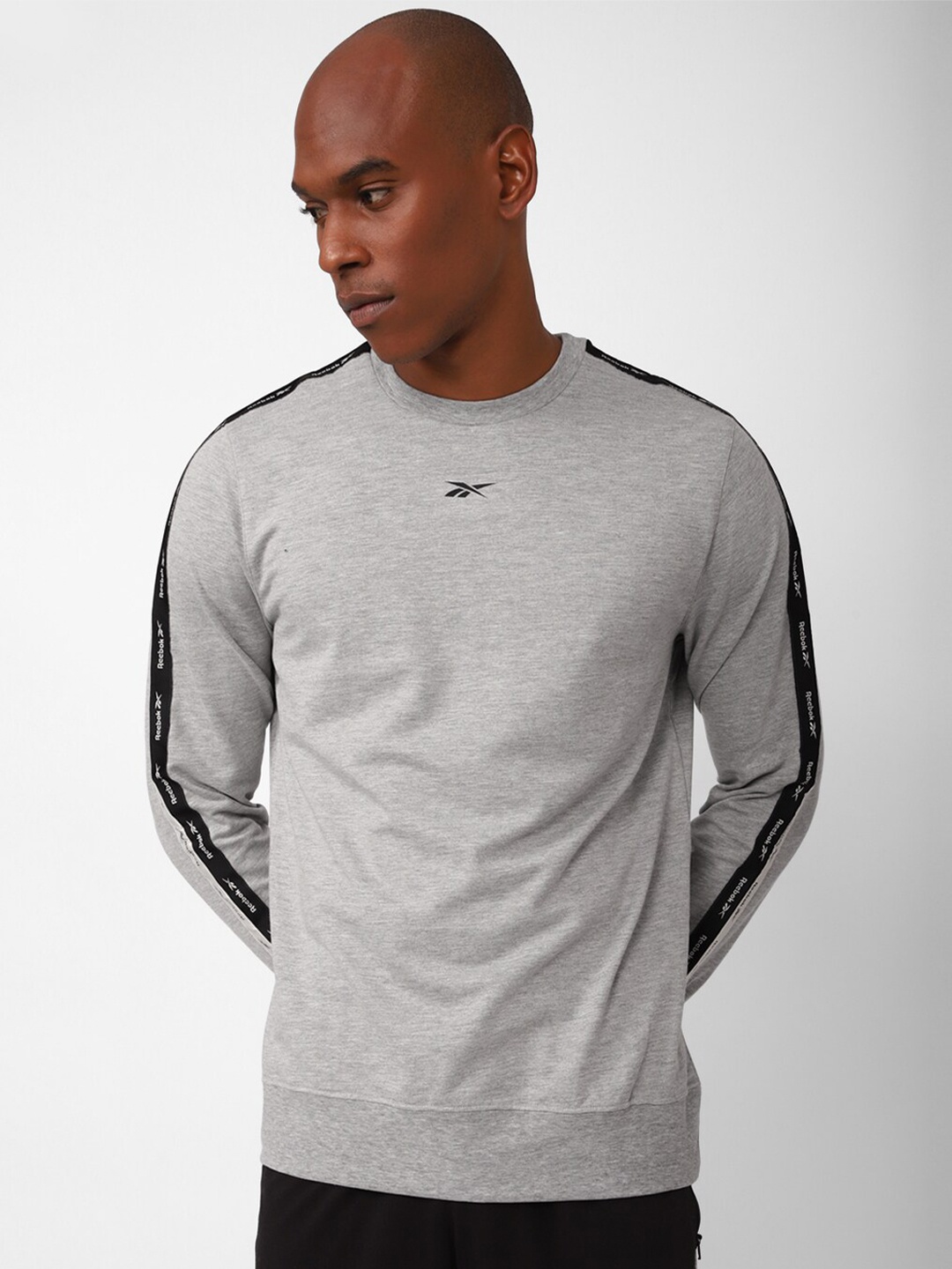 

Reebok Men Training Essentials Dual Tape Enh Sweatshirt, Grey