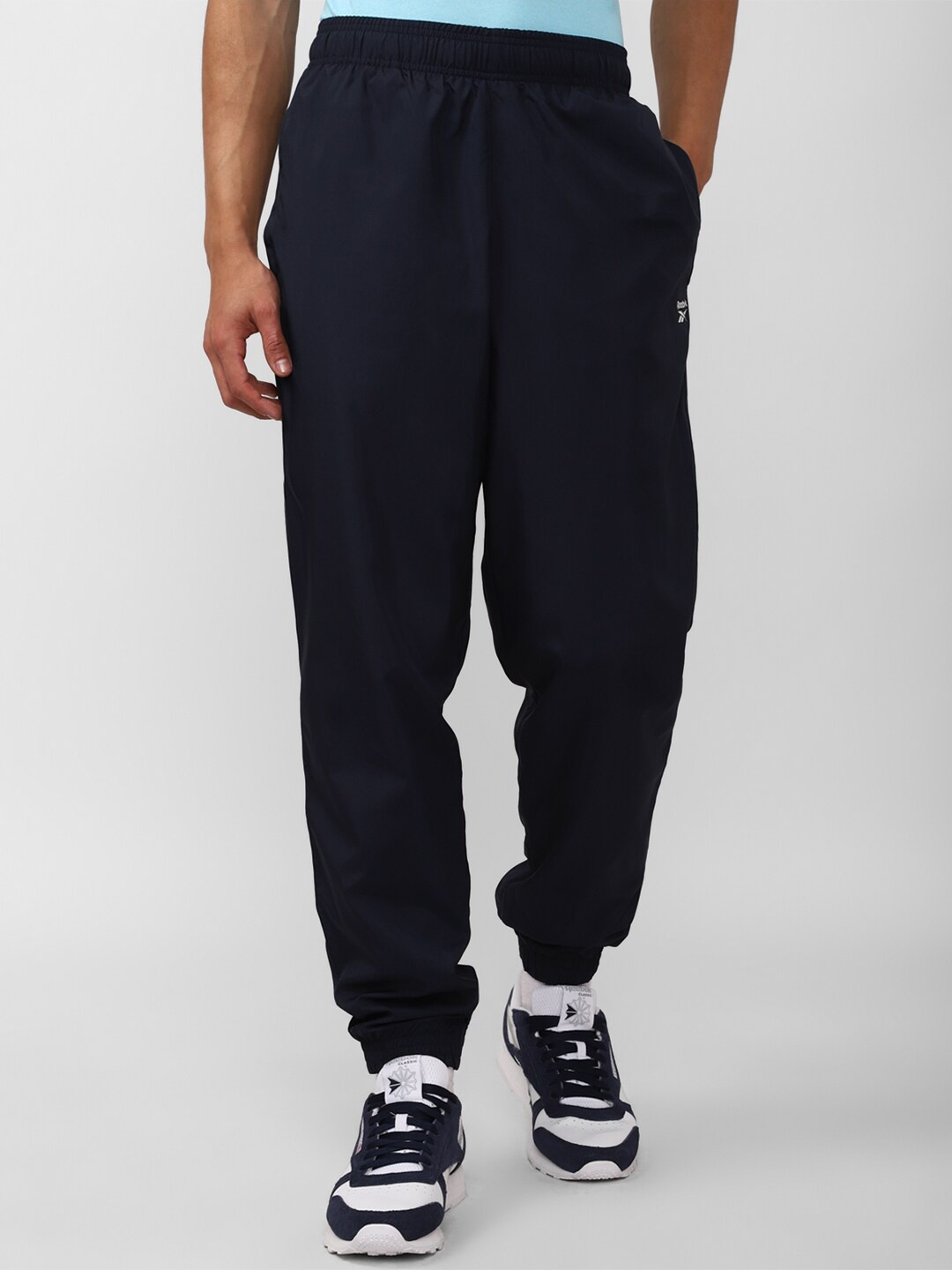 

Reebok Men Slim-Fit Training Essentials Woven C Lined Joggers, Navy blue