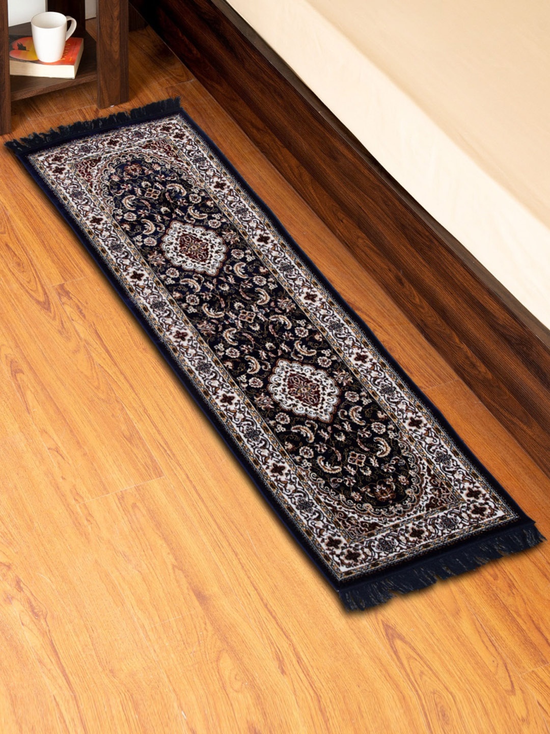 

Home Centre Corsica Tapis Blue & White Ethnic Motifs Woven Carpet