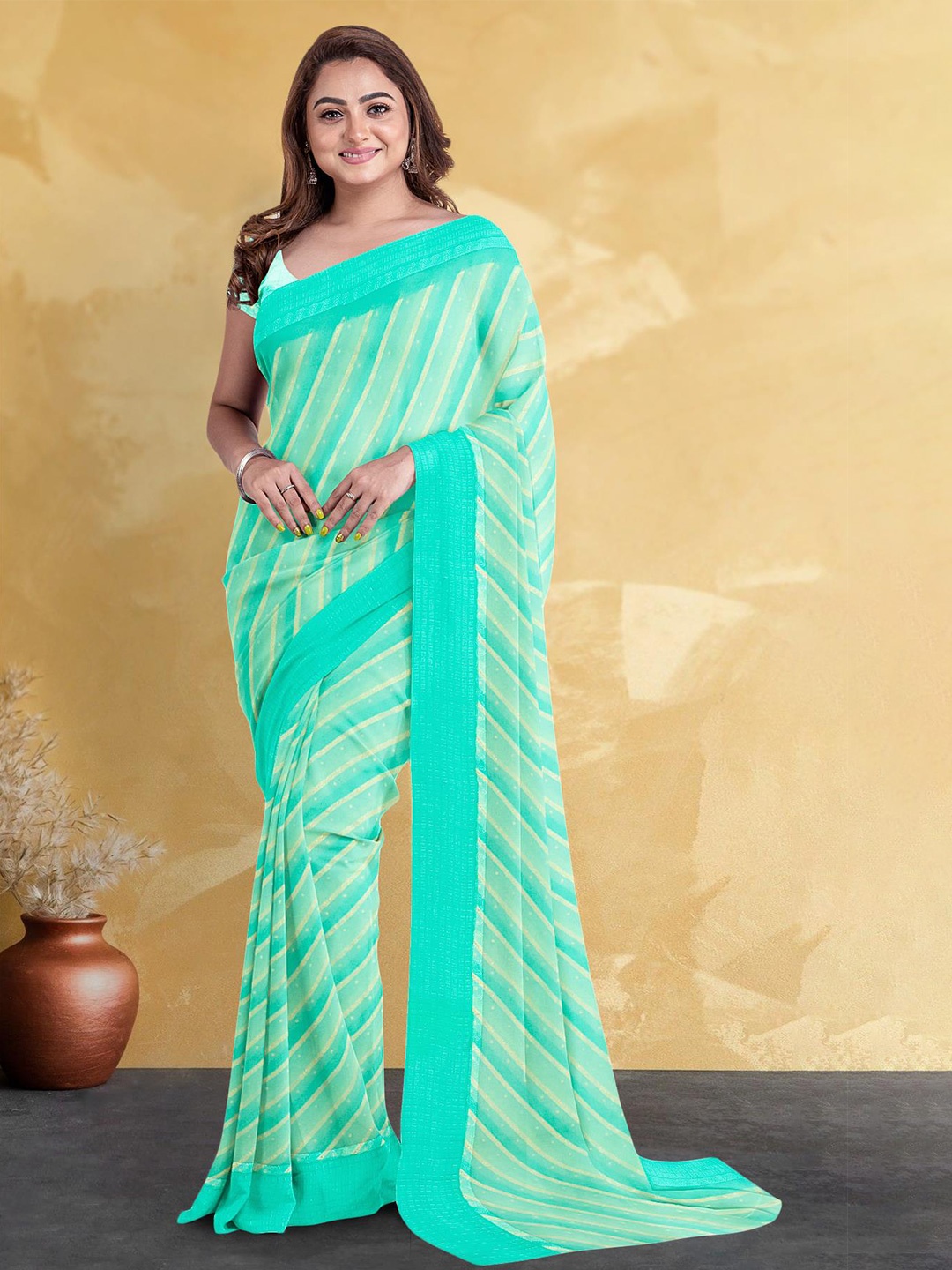 

Kalamandir Striped Woven Design Bordered Saree, Sea green