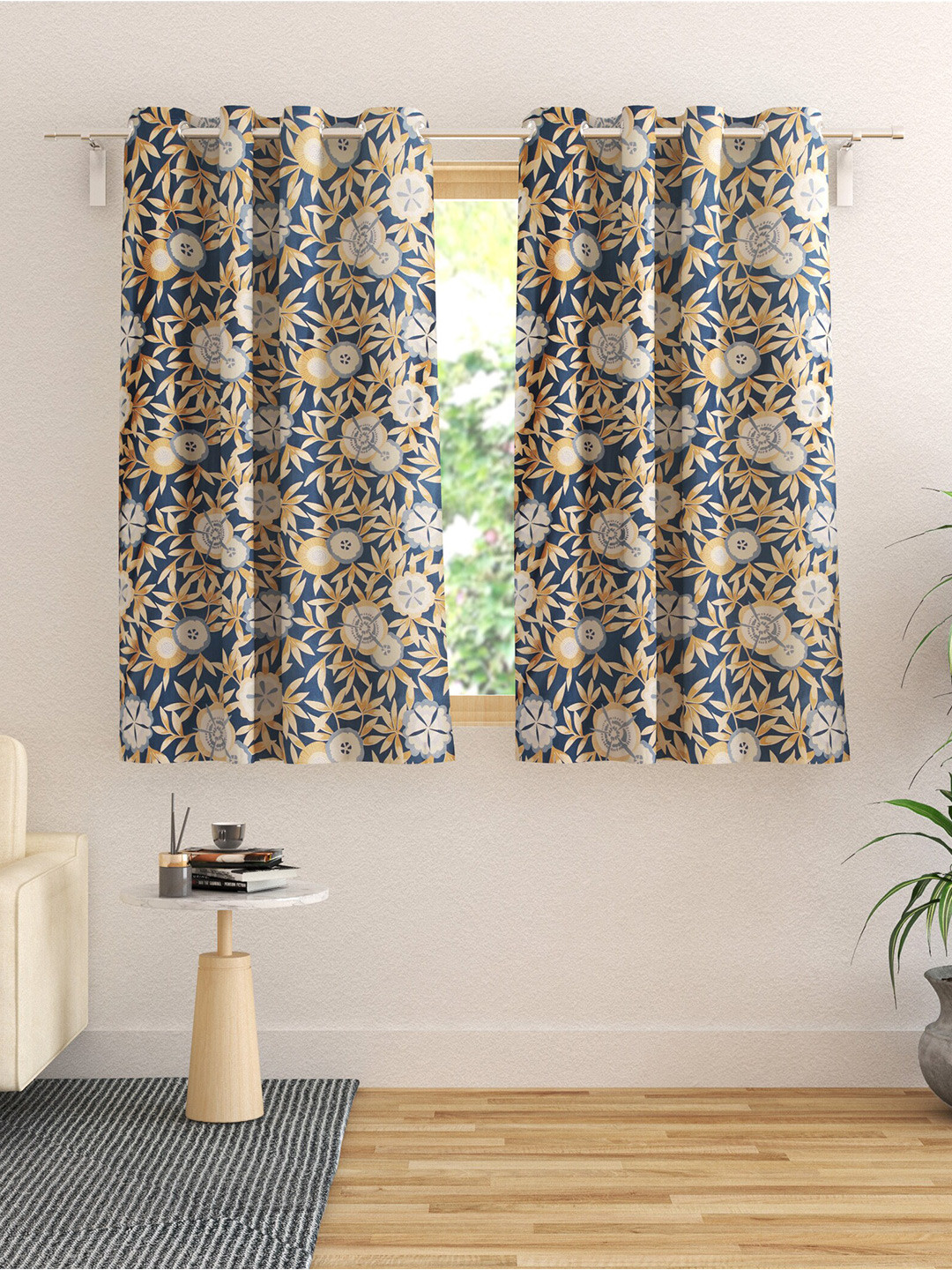 

Home Centre Essentials Vivian Set Of 2 Blue & Brown Floral Black Out Window Curtains