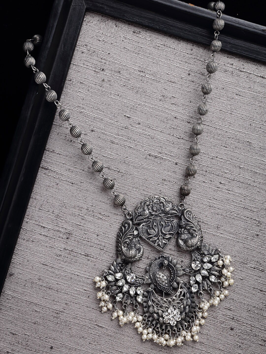 

PANASH Women Silver-Toned Kundan & Beads Peacock Shaped Oxidized Necklace