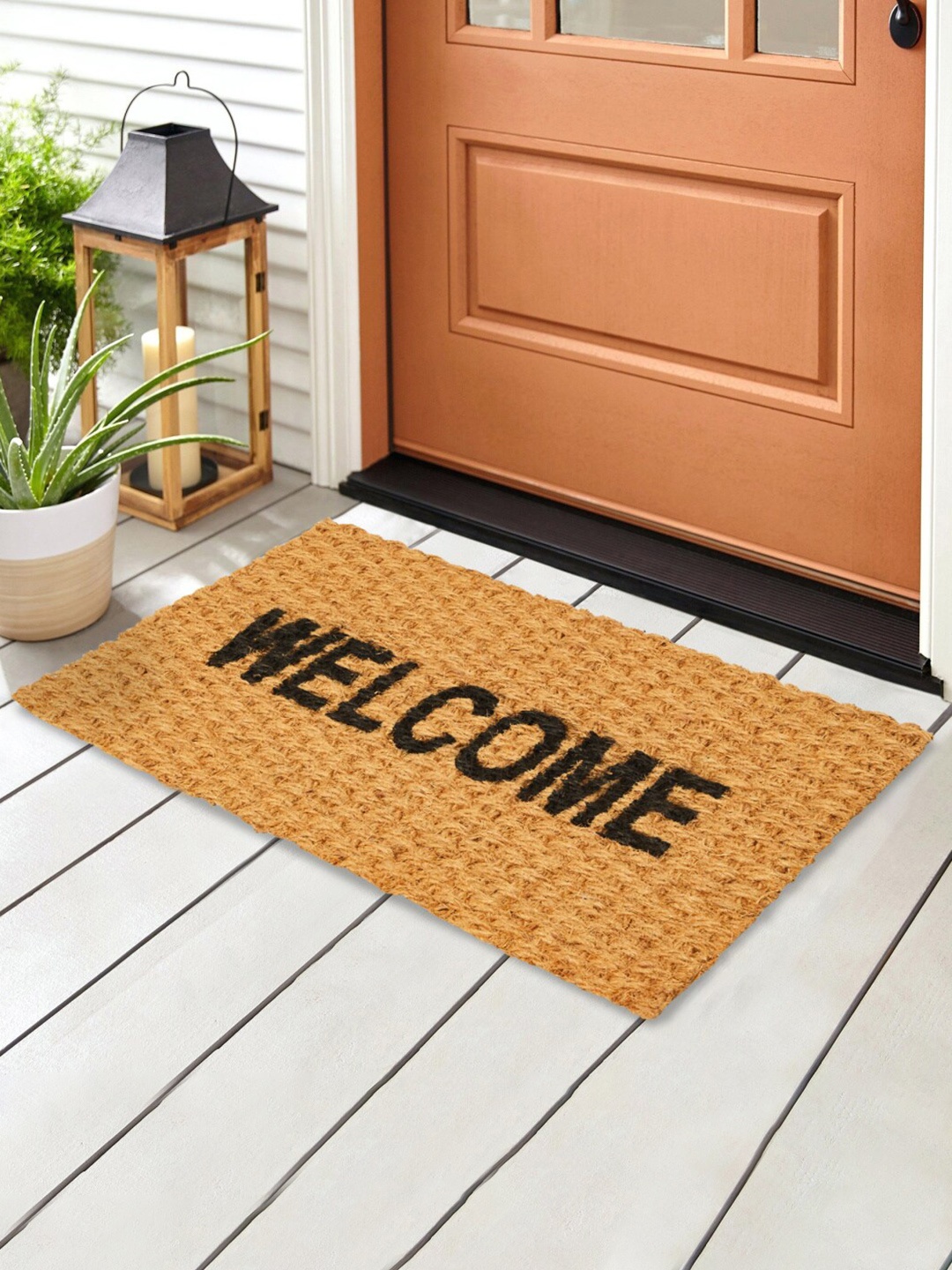 

Home Centre Radiance Beige & Black Printed Anti-Skid Floor Mat