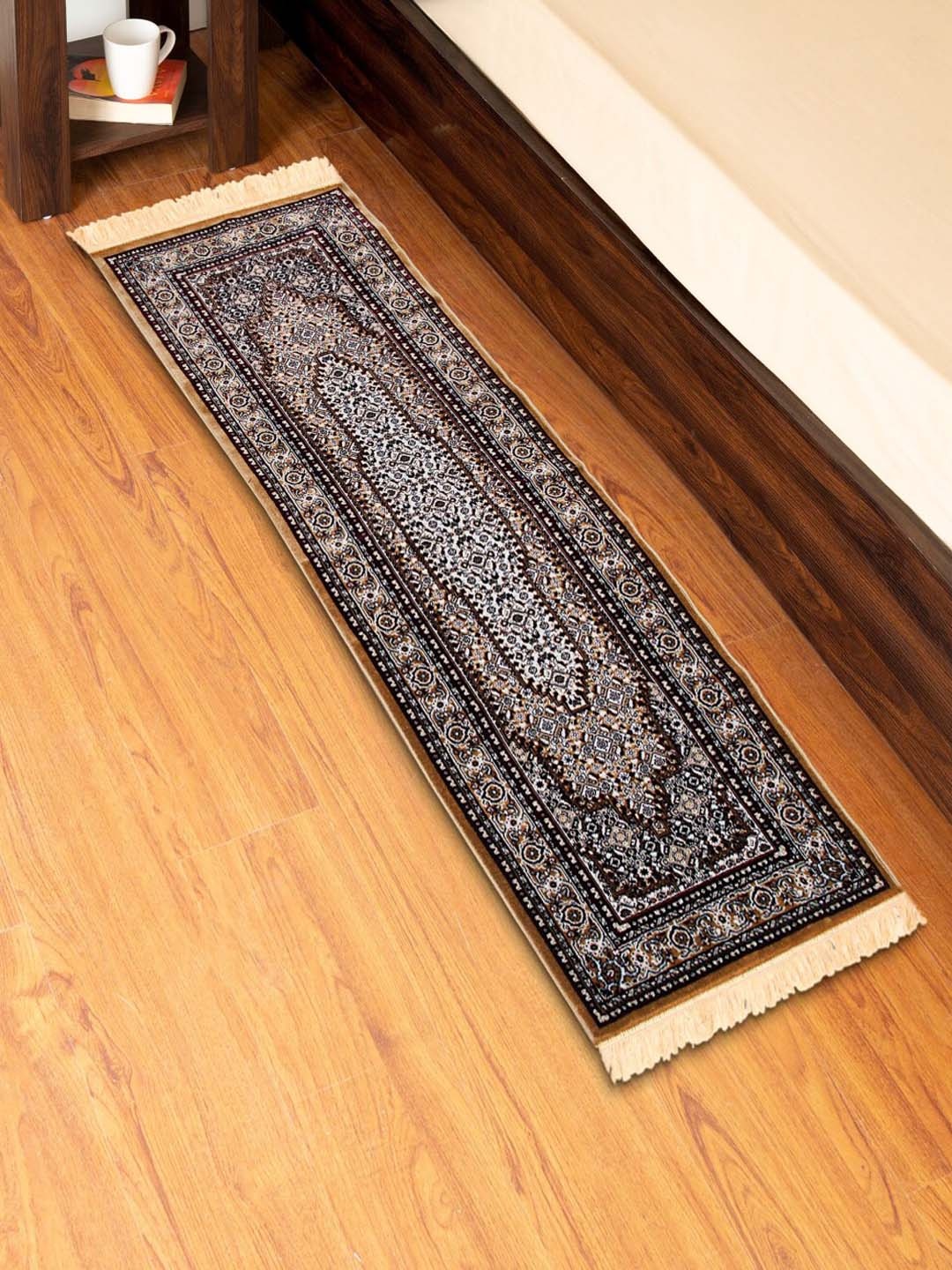 

Home Centre Corsica Tapis Gold-Toned & Brown Printed Anti-Skid Woven Floor Dhurries