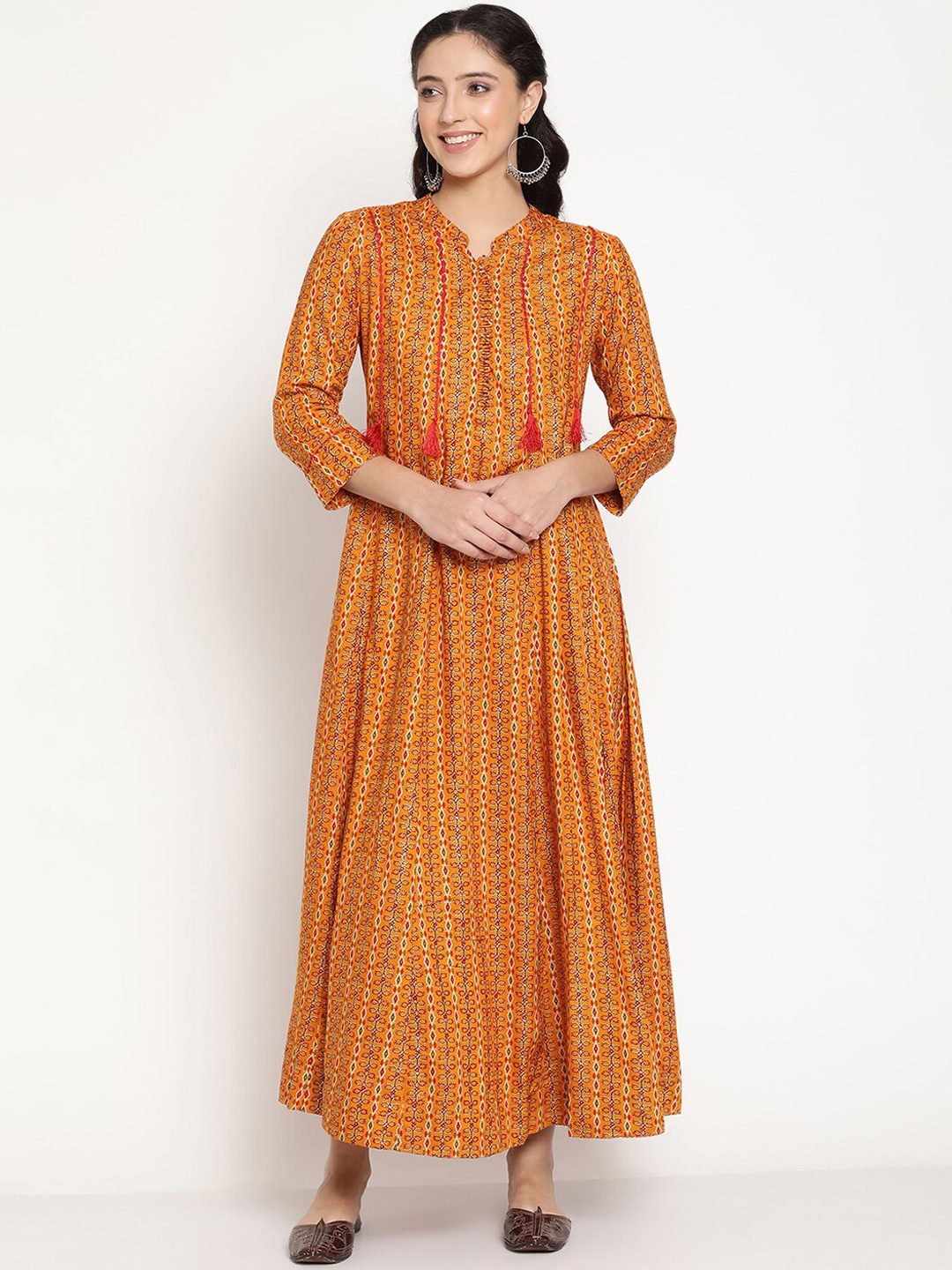 

Be Indi Women Ethnic Motifs Printed Flared Maxi Dress, Mustard