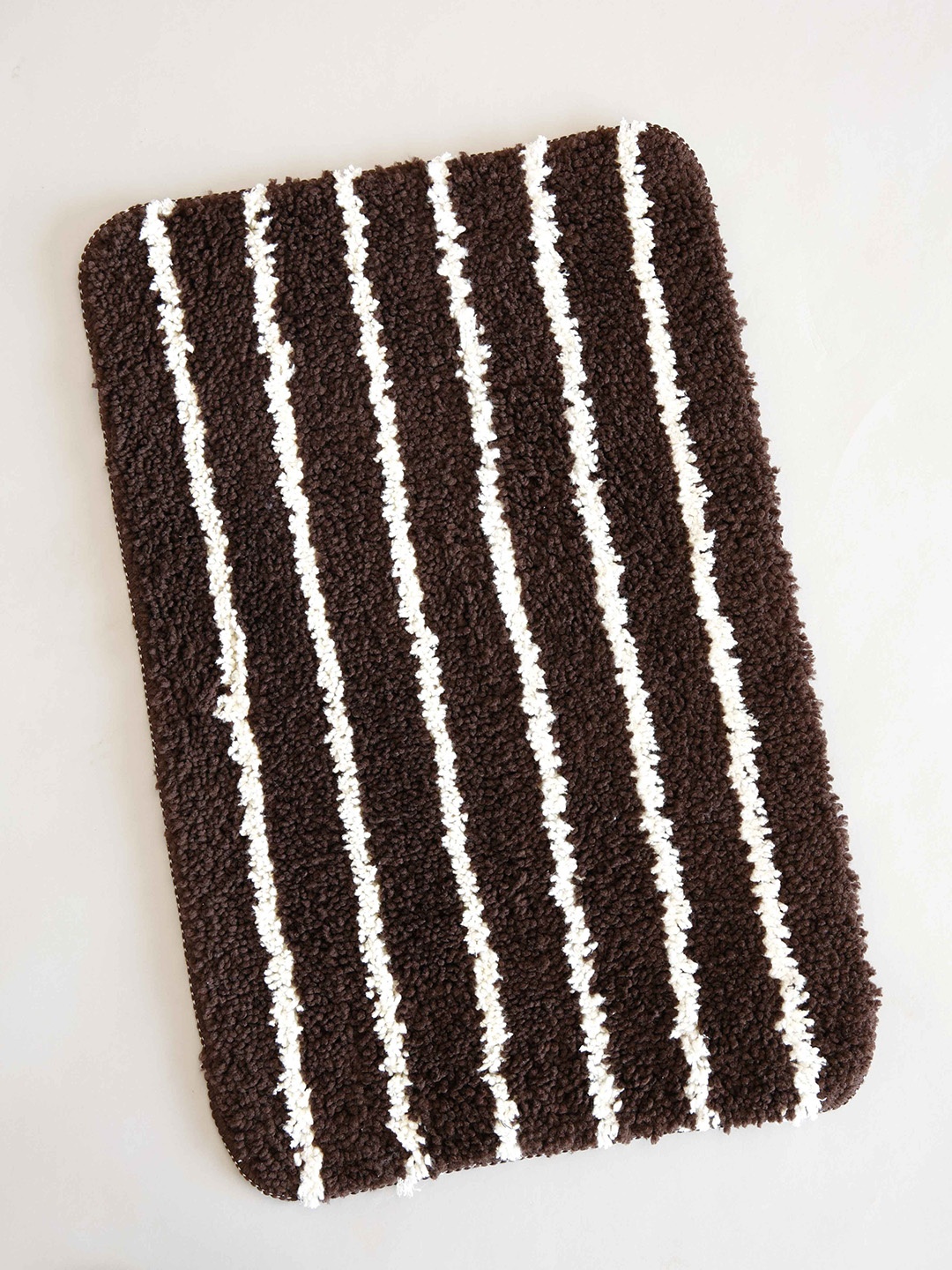 

Ariana 2 Pcs Brown & White Striped 1600 GSM Microfibre Anti-Skid Bath Rugs