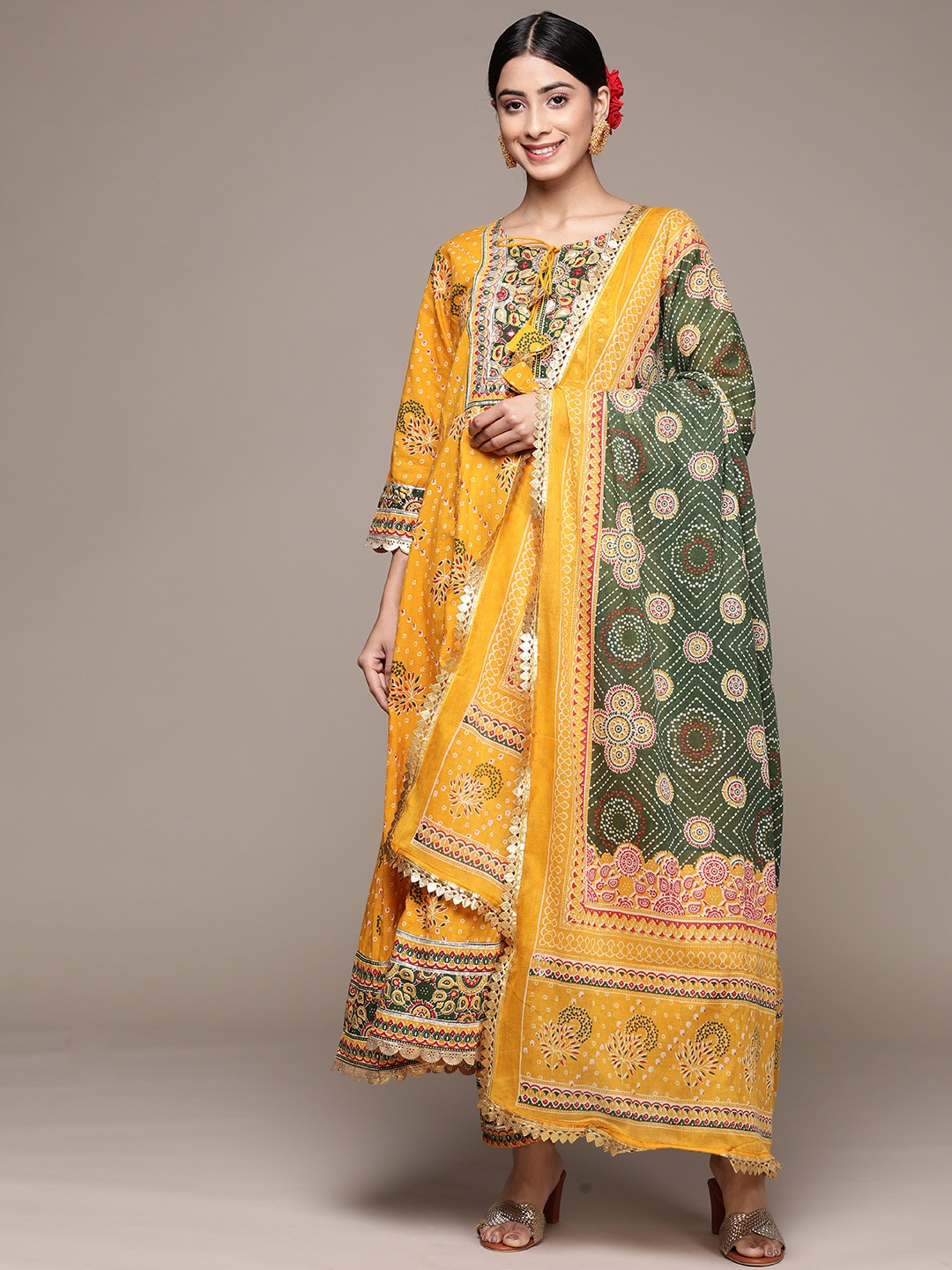 

Anubhutee Women Ethnic Motifs Printed Mirror Work Pure Cotton Kurta Set, Mustard