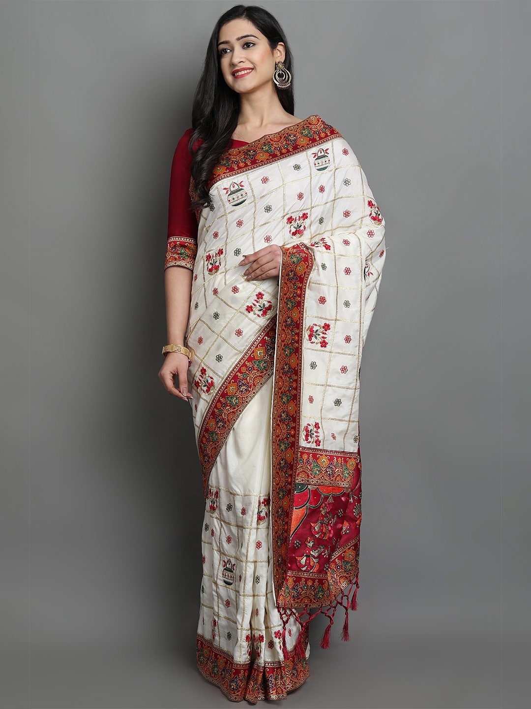 

Ekta Textiles Ethnic Motifs Embroidered Patola Saree, White