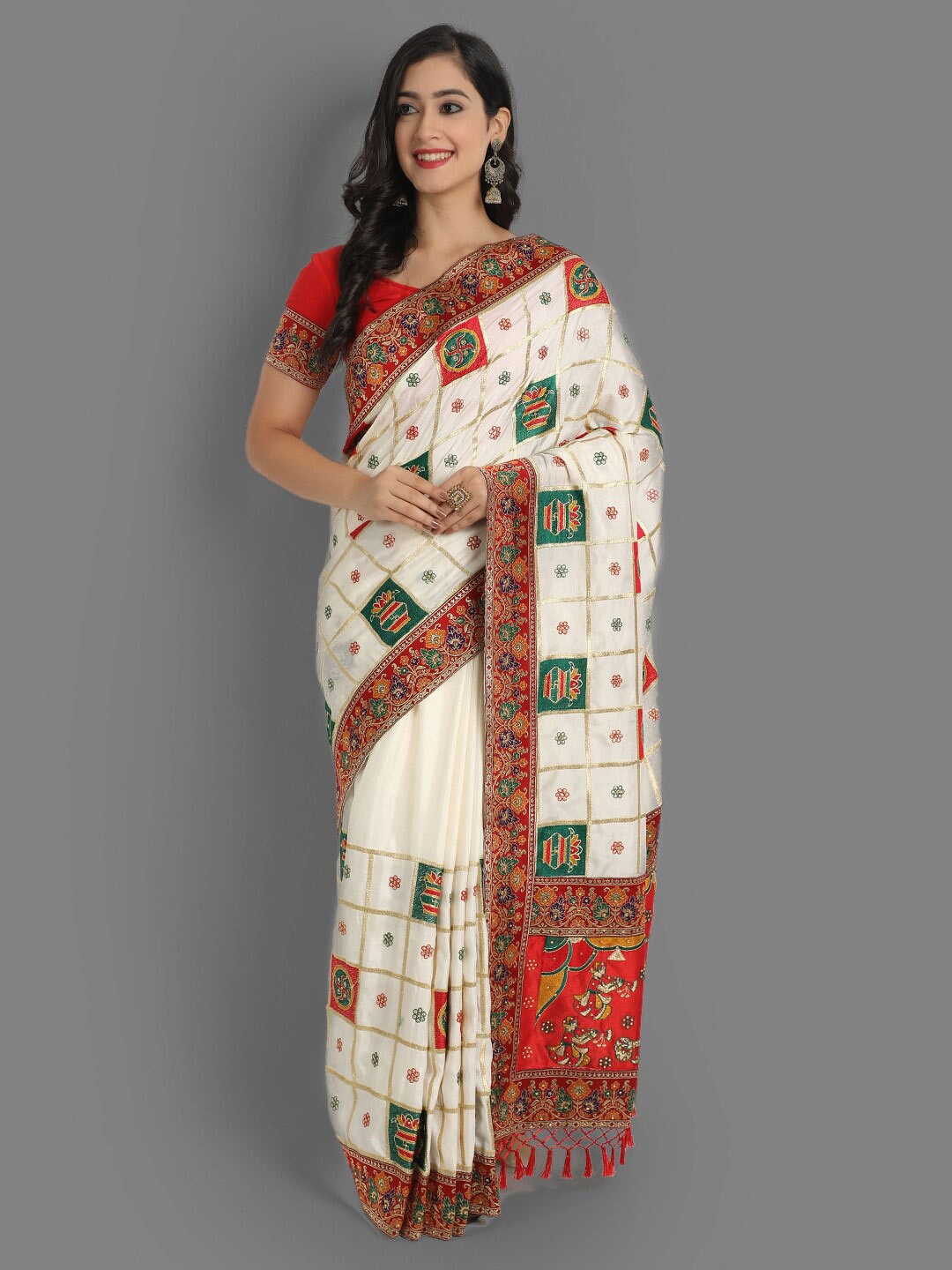 

Ekta Textiles Ethnic Motifs Beads and Stones Silk Blend Patola Saree, White